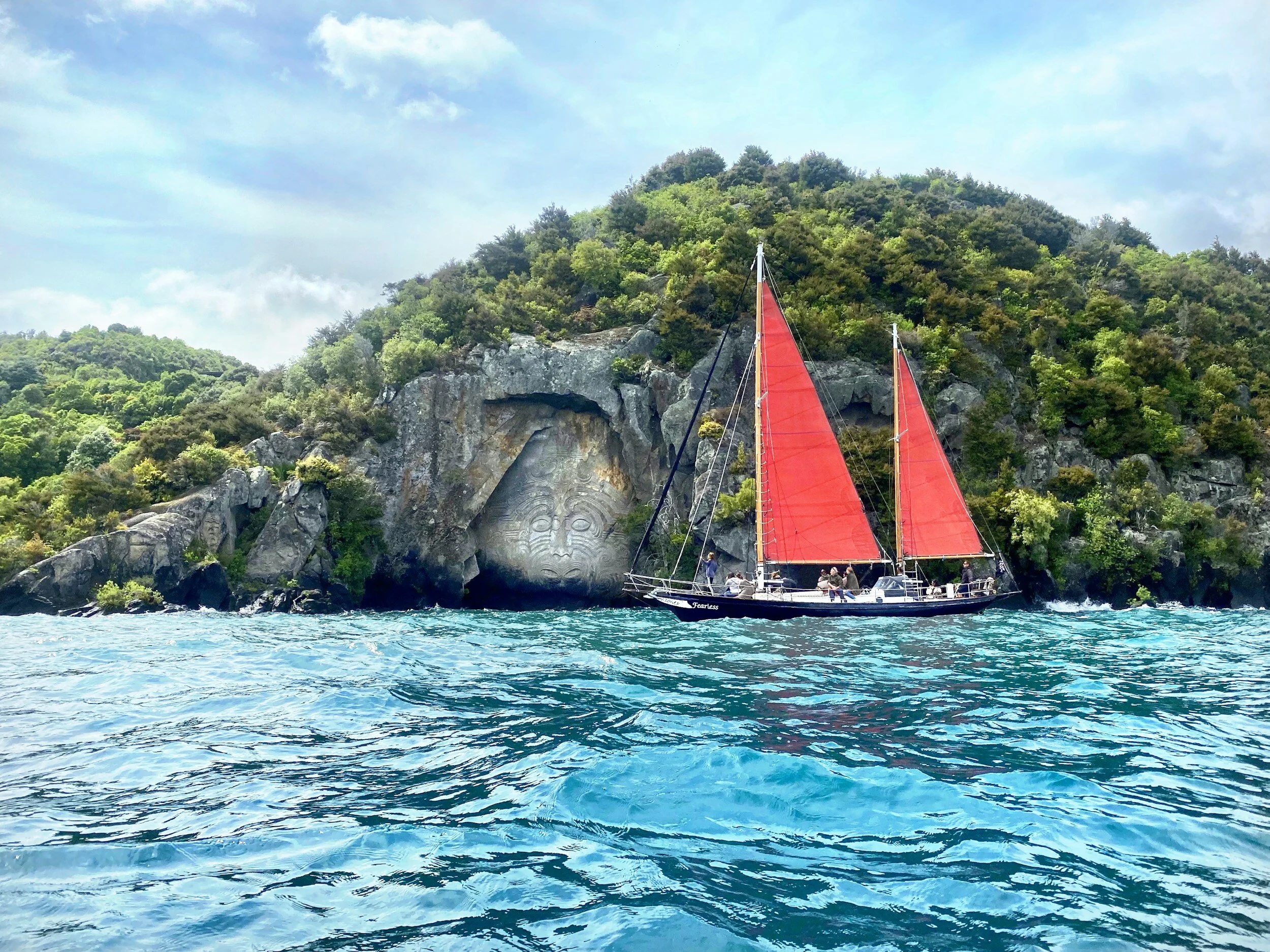 Great North Tours Lake Taupō scenic boat cruise and snow-capped mountains