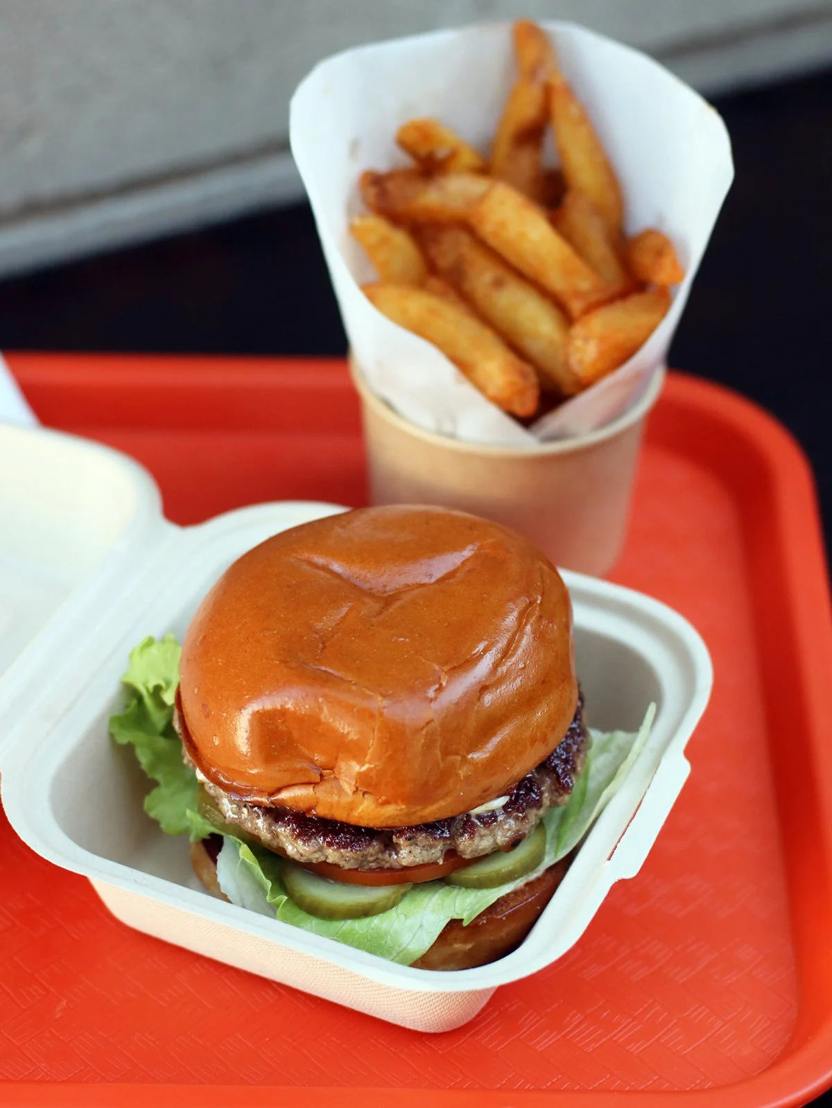 Juice Cheeseburger with a side of Fries.