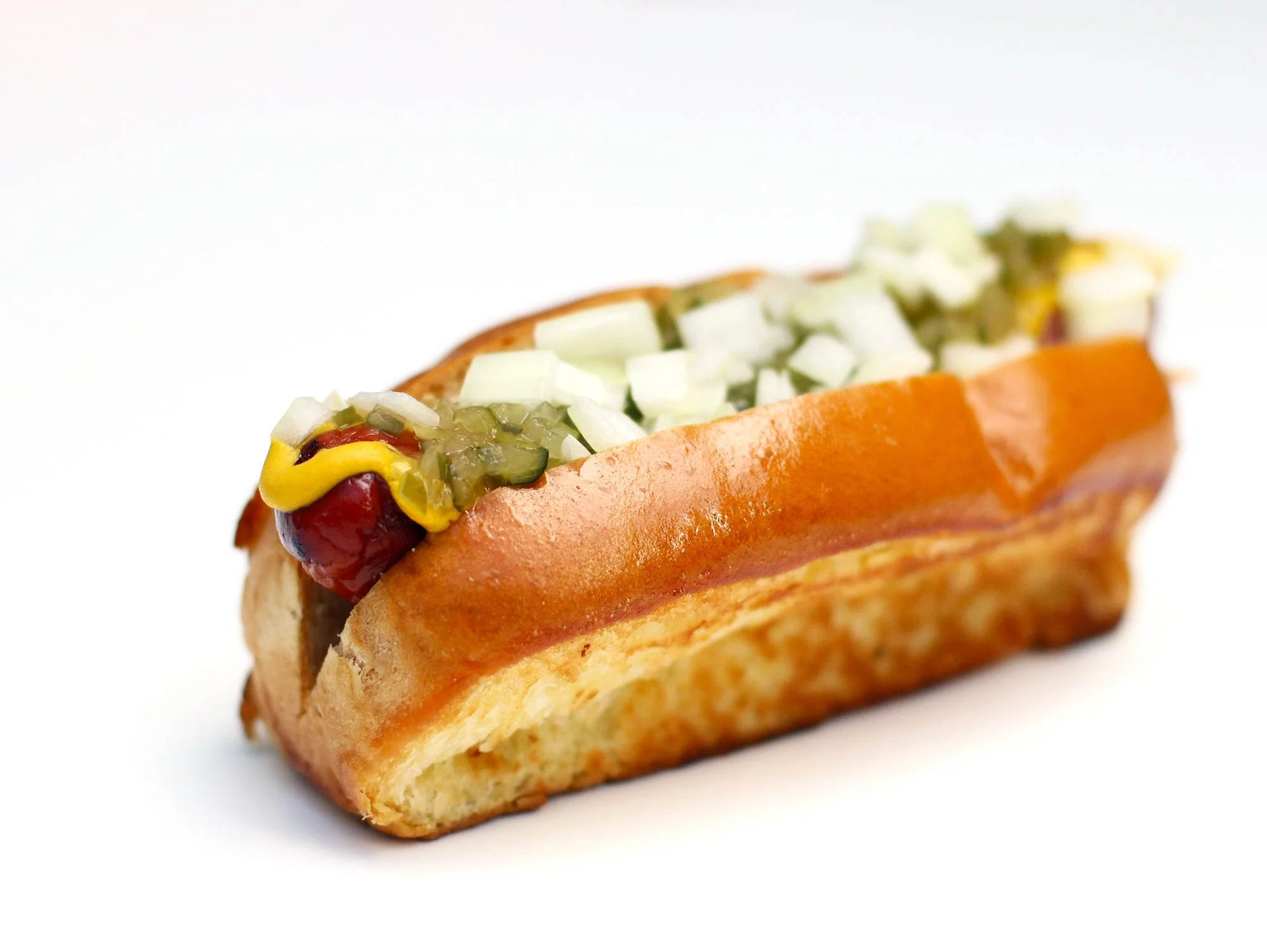 Classic Hot Dog with Yellow Mustard, Relish, and Chopped Onions