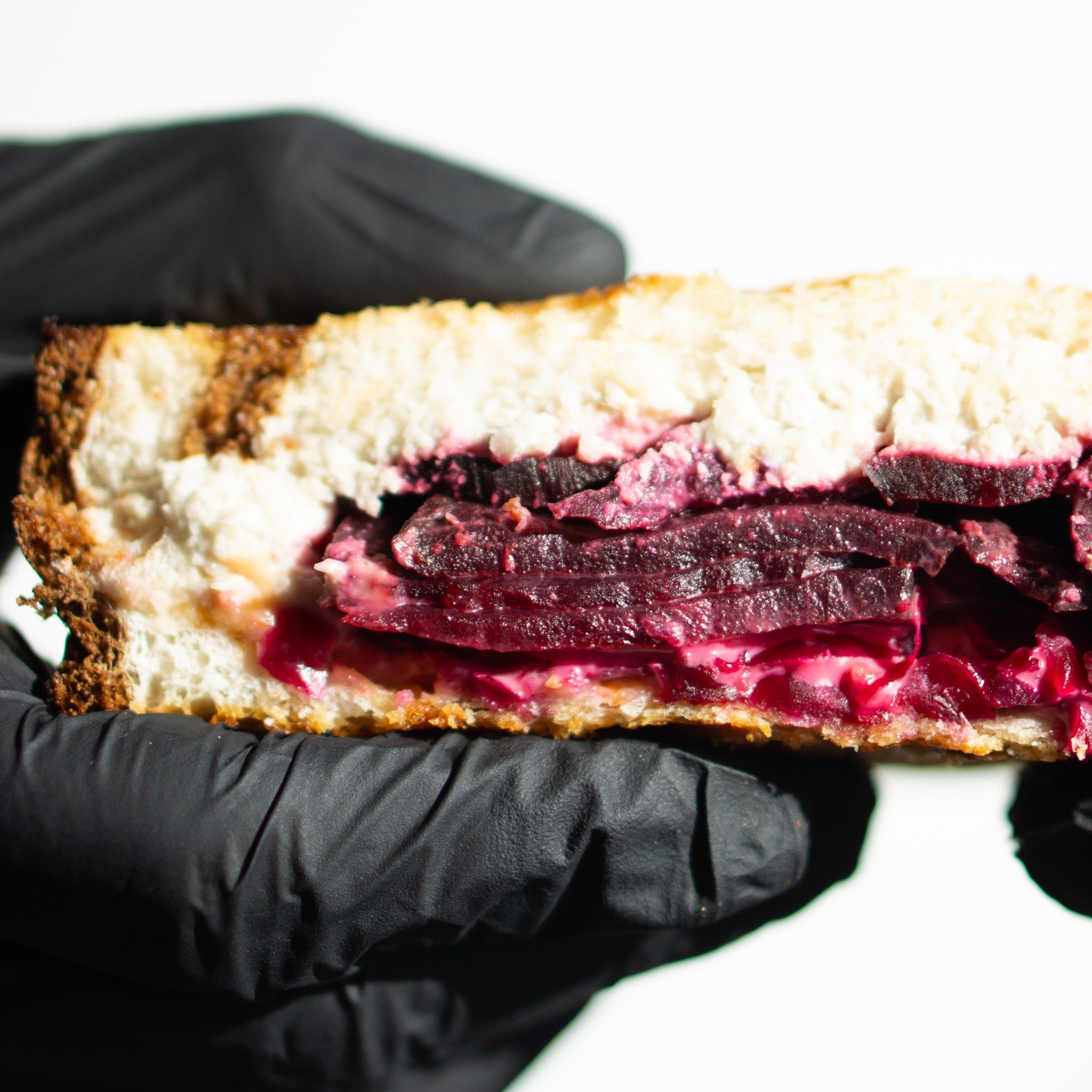 Have you tried the unbeetable yet? It's our seasonal vegan sandwich offering, made with applewood-smoked beets, thousand island dressing, purple sauerkraut, and house-made vegan goat cheese (Trust us, it's better than anything you buy in-store). It i