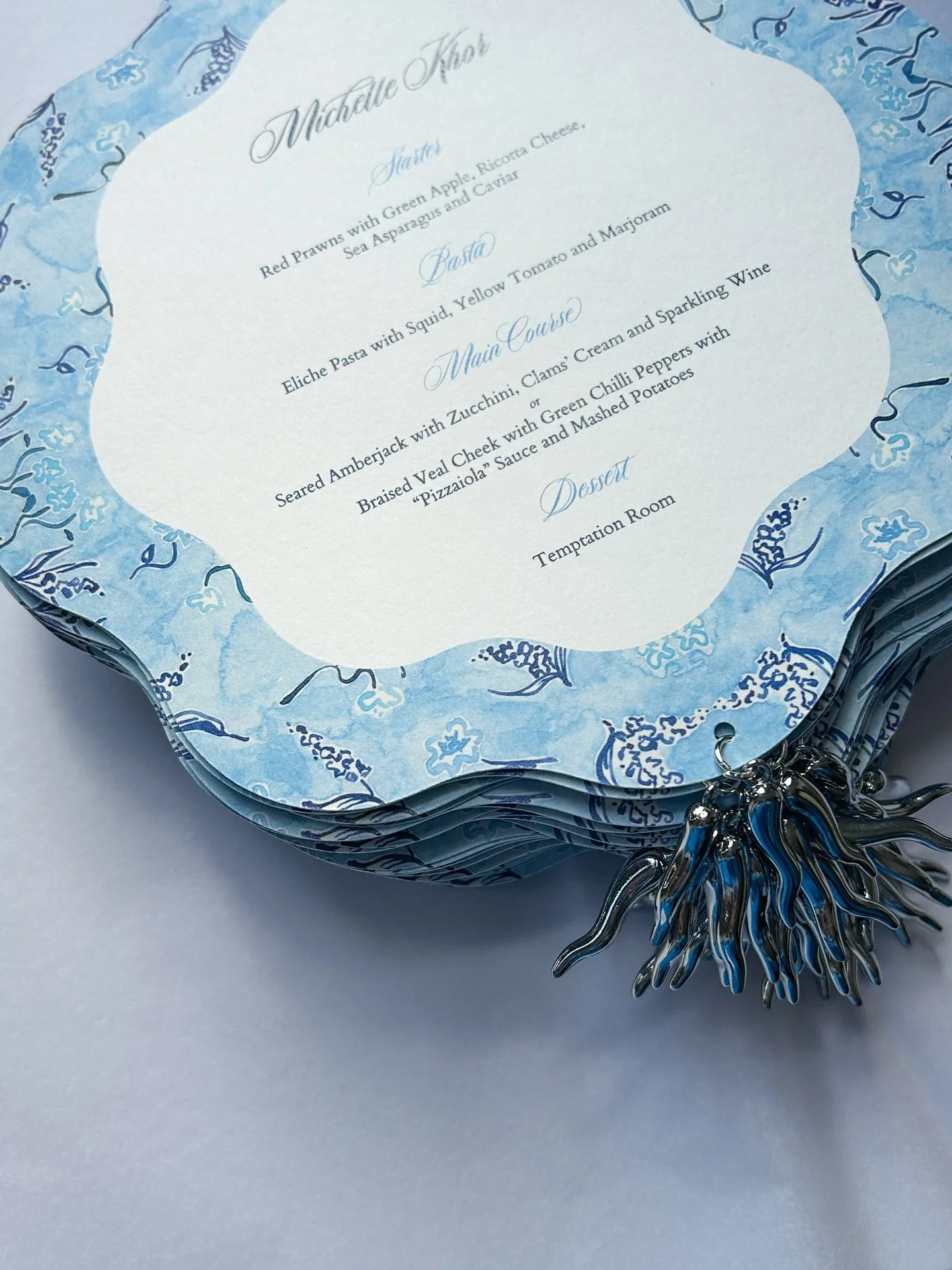 A hand painted pattern, custom shape, and cornicello charm for good luck. 

💌 #weddingstationery #capriwedding #destinationwedding