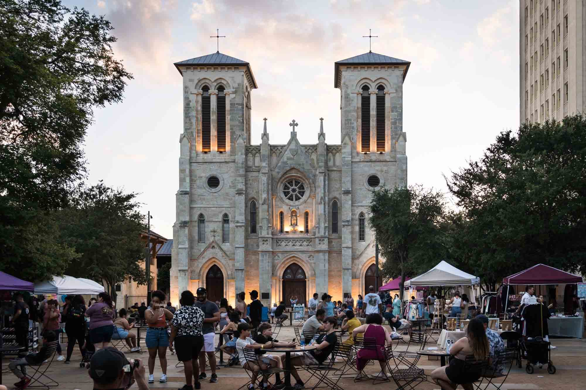 Tourists in front of the San Fernando Cathedral at sunset by San Antonio travel photojournalist, Kelly Williams (Copy)