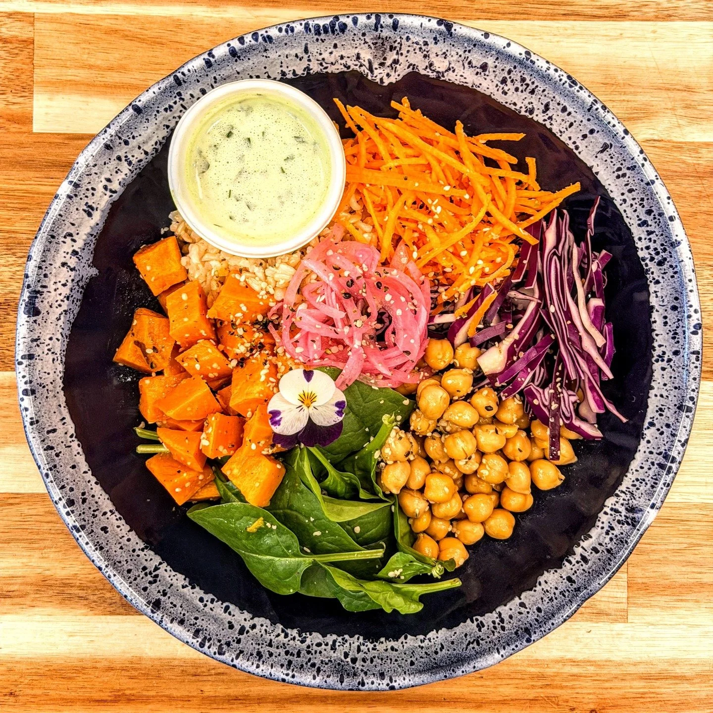 Treat your body like a temple.... our new Buddha Bowl is now on the menu!

Heart-healthy brown rice with baked sweet potato, citrus marinated chickpeas, baby leaf spinach, shredded carrot, red cabbage, house pickled onion and hemp seeds. All this hea