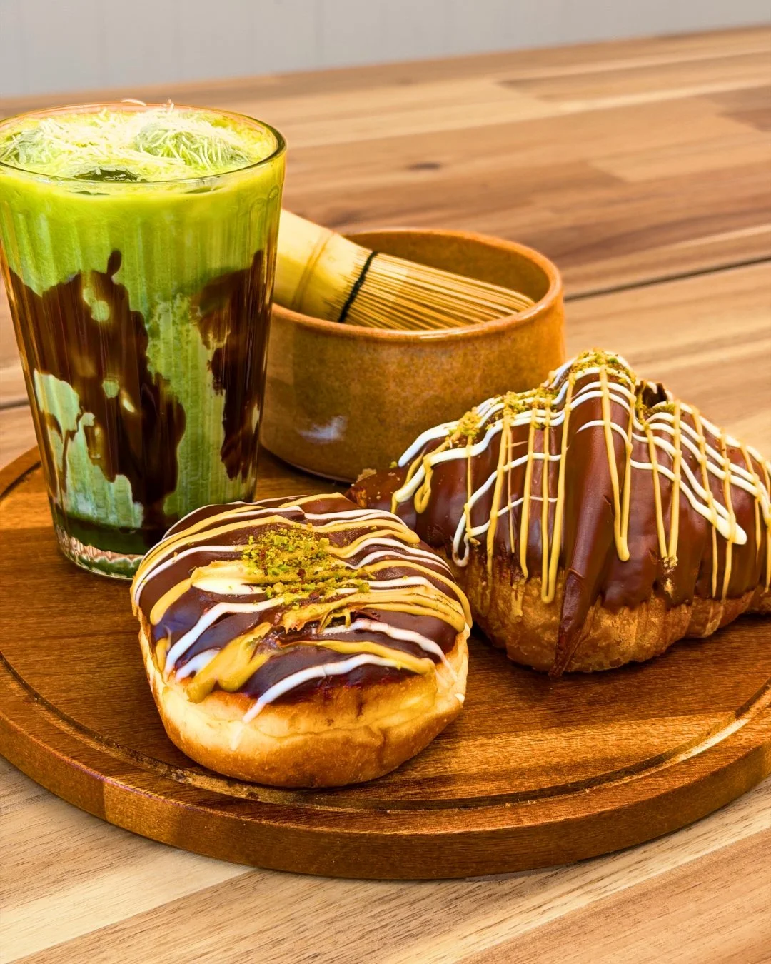 OUR NEW ITEMS ARE DUBAI FOR! 🍩🍵🥐

Get your Dubai Chocolate fix at Bang Bowls Cafe &amp; Restaurant today....

Our Iced Dubai Matcha is made with our high-grade Japanese matcha hand-whisked to perfection - plus the addition of premium chocolate &am