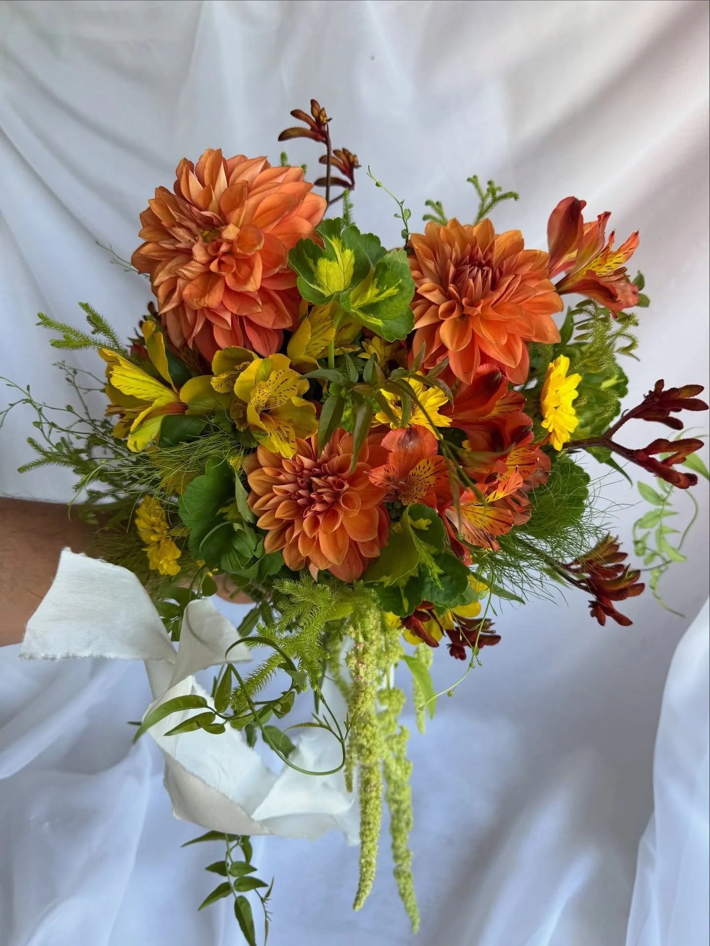 Alyssa + Darcy and their intimate garden wedding @suzarosabluemountains ✨

We loved creating something a little different with burnt orange tones, yellow, burgundy and lush greenery!

Thank you @grumpyflowers_ for your help and @karenbrown.celebrant.