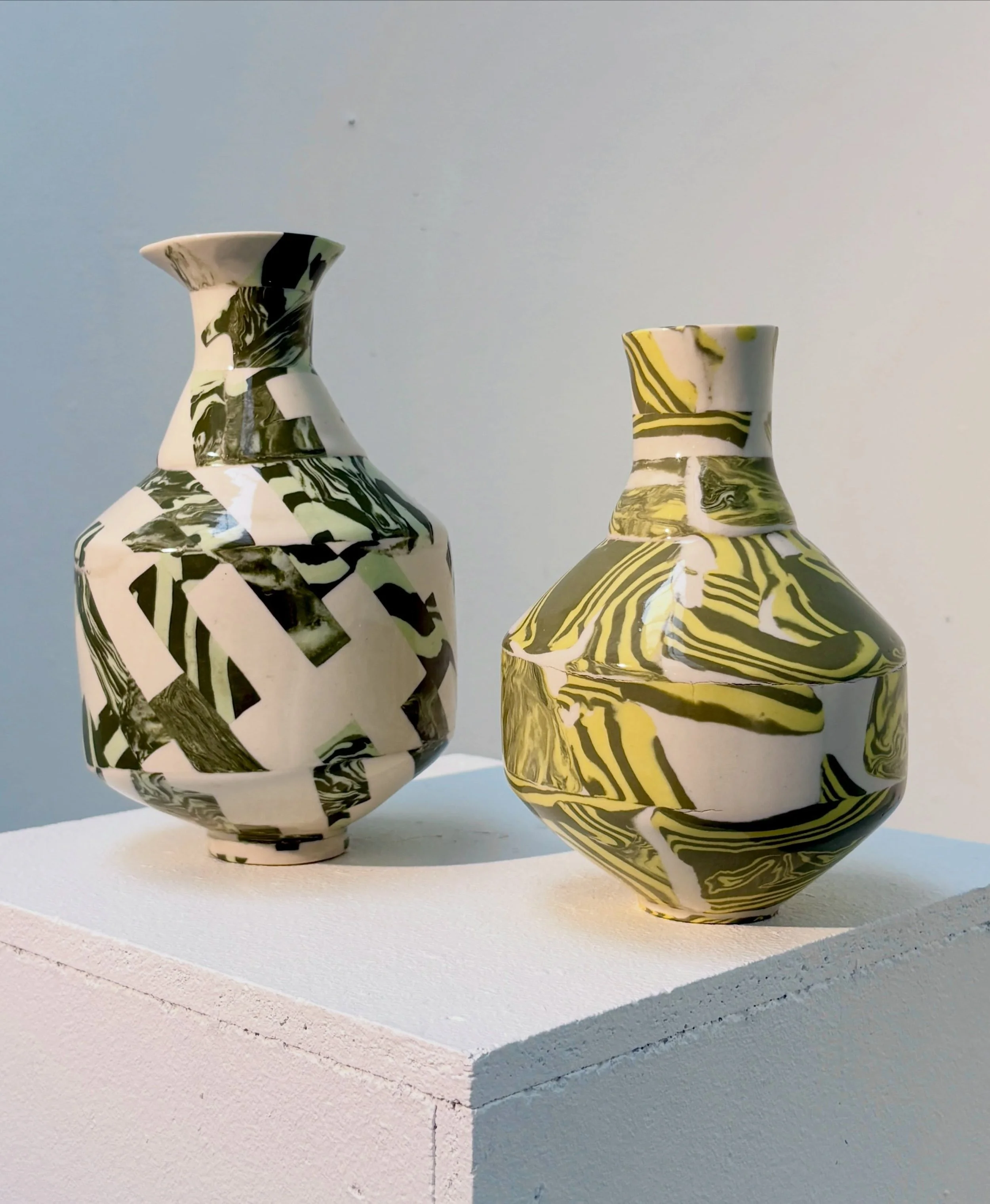Some early nerikomi experiments with color and pattern, inspired by cartography. 🗺️ Small vases made before the Varsel series took shape.