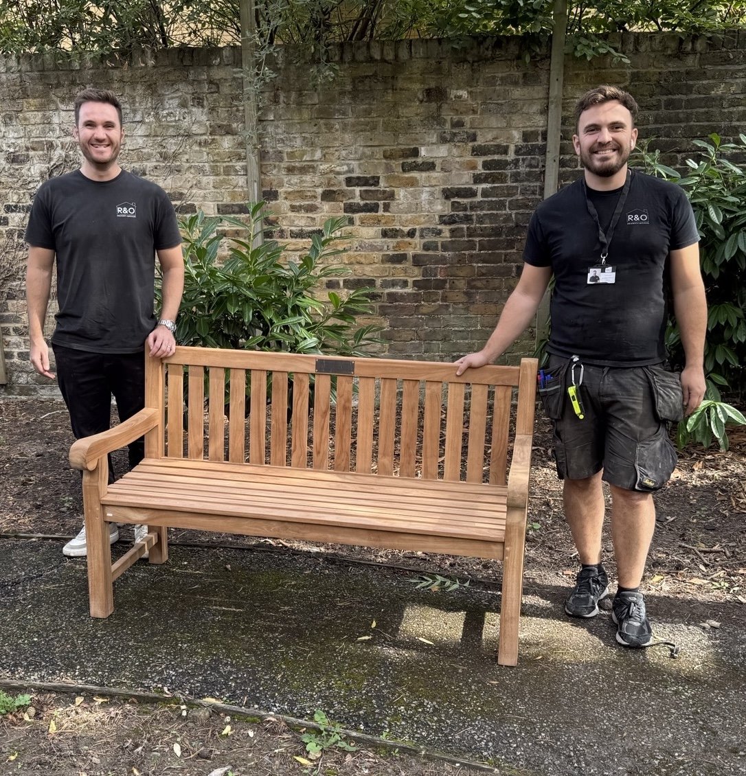 R&O Property Services Directors Alex and Zach replacing a broken memorial bench in Lewisham, London to give back to the community.