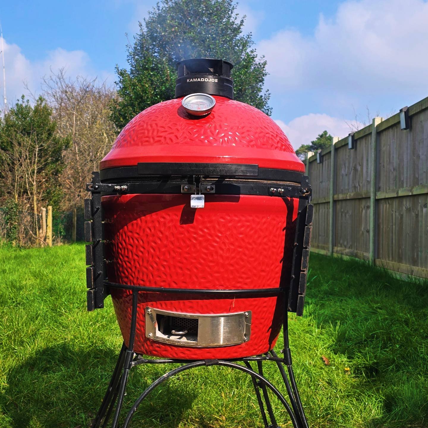 Sun is out, rain clouds are nowhere to be seen, grass is green, charcoal lit, whiskey barrel wood is smoking away. 

The @kamadojoe #classic2 has really changed the way I cook outside, I've started to use it for everyday cooking and recently did a fu