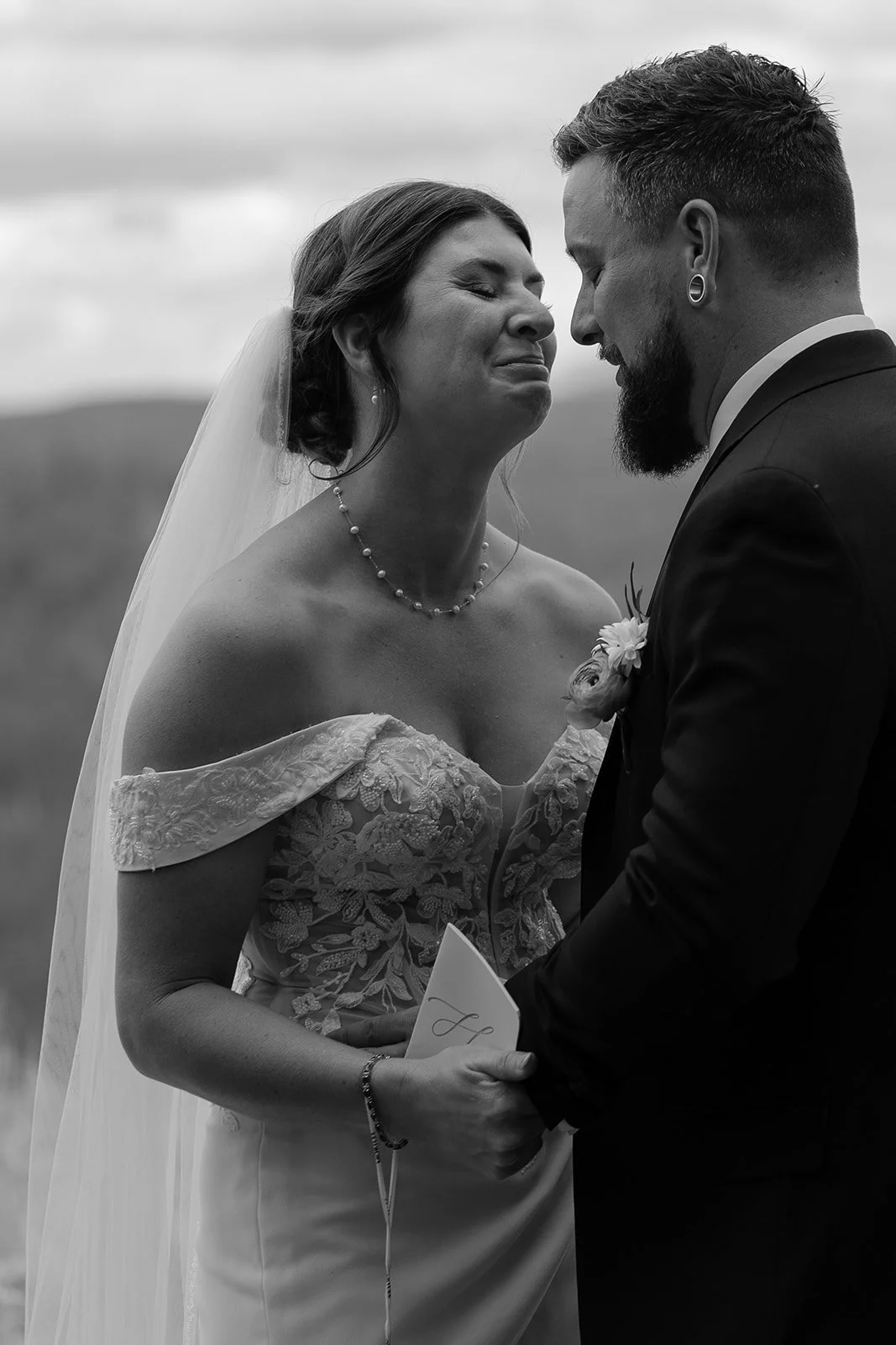 Couple embracing emotionally after their private vows at Granby Ranch. Photography by Trail Magic Elopements and Micro Weddings.