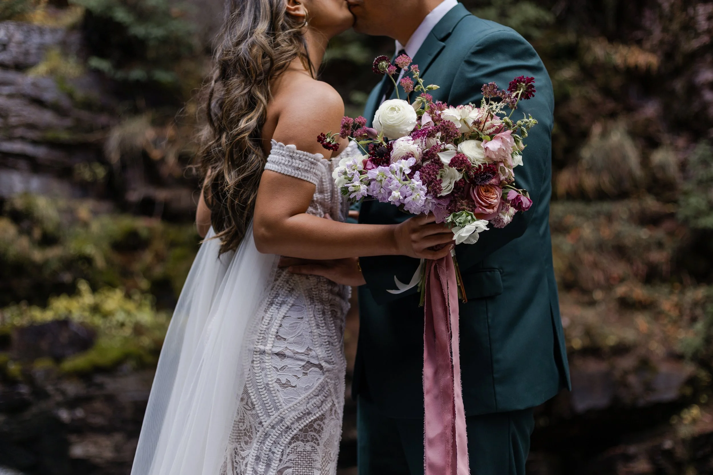 Couple embracing close up on their elopement day in the San Juan Mountains. Photography by Trail Magic Elopements and Micro Weddings.