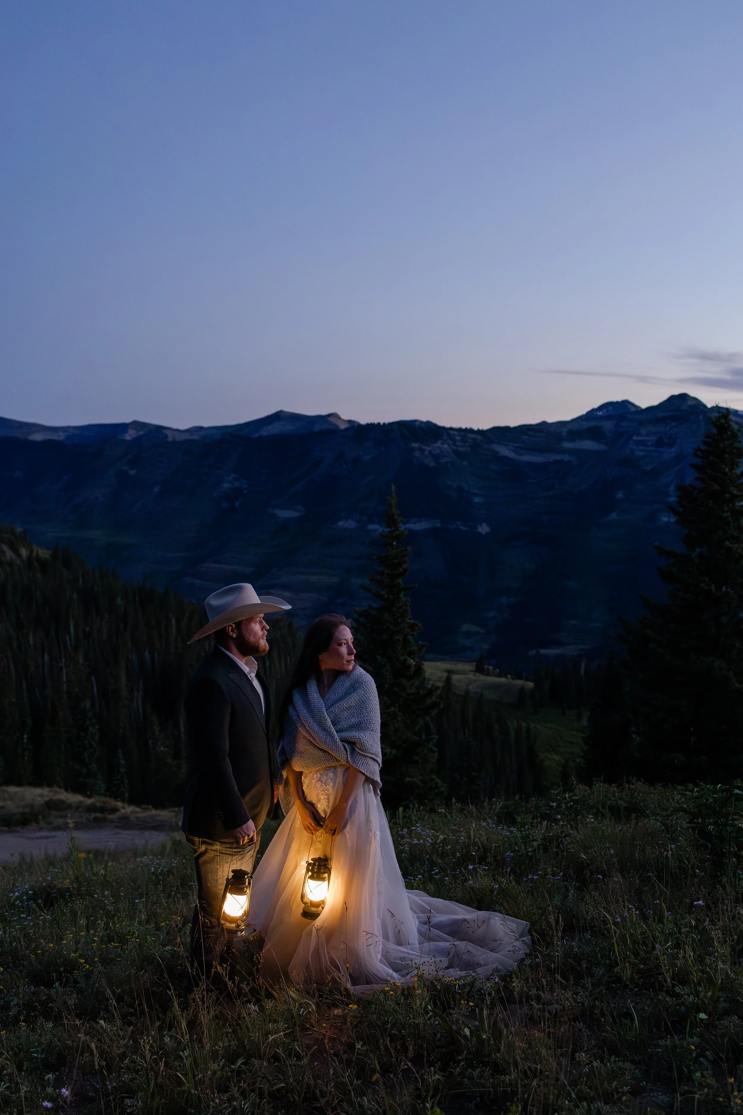Couple looking out into the sunset after their wedding ceremony near Crested Butte, Colorado. Photography by Trail Magic Elopements and Micro Weddings.