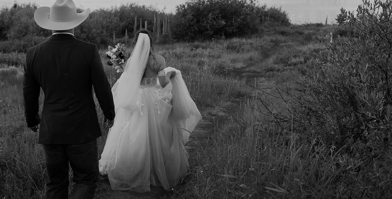 Couple walking towards Peanut Lake for their micro wedding ceremony in Crested Butte, Colorado. Photography by Trail Magic Elopements and Micro Weddings.
