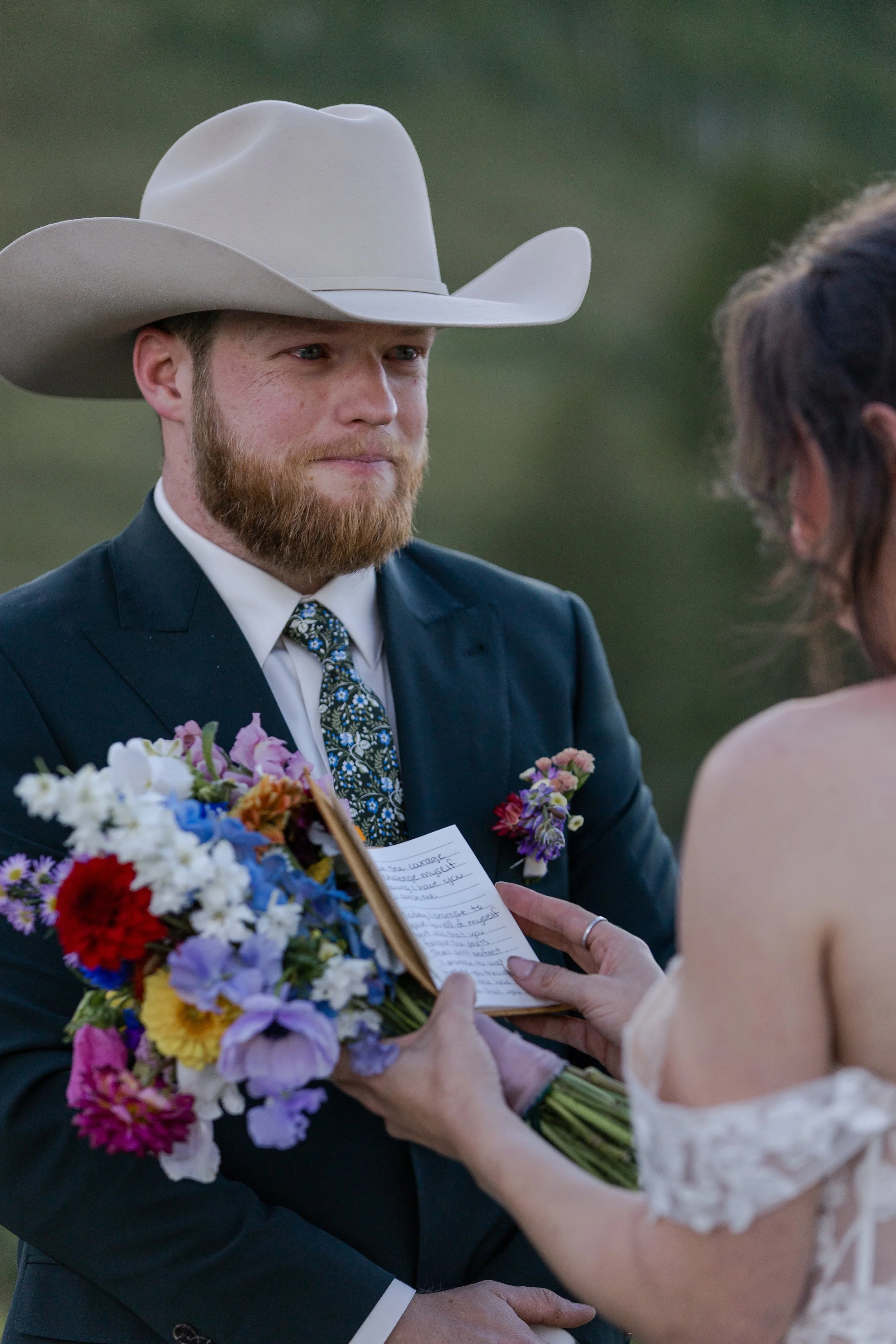 Couple sharing private vows on the shore of Peanut Lake in Crested Butte, Colorado. Photography by Trail Magic Elopements and Micro Weddings.