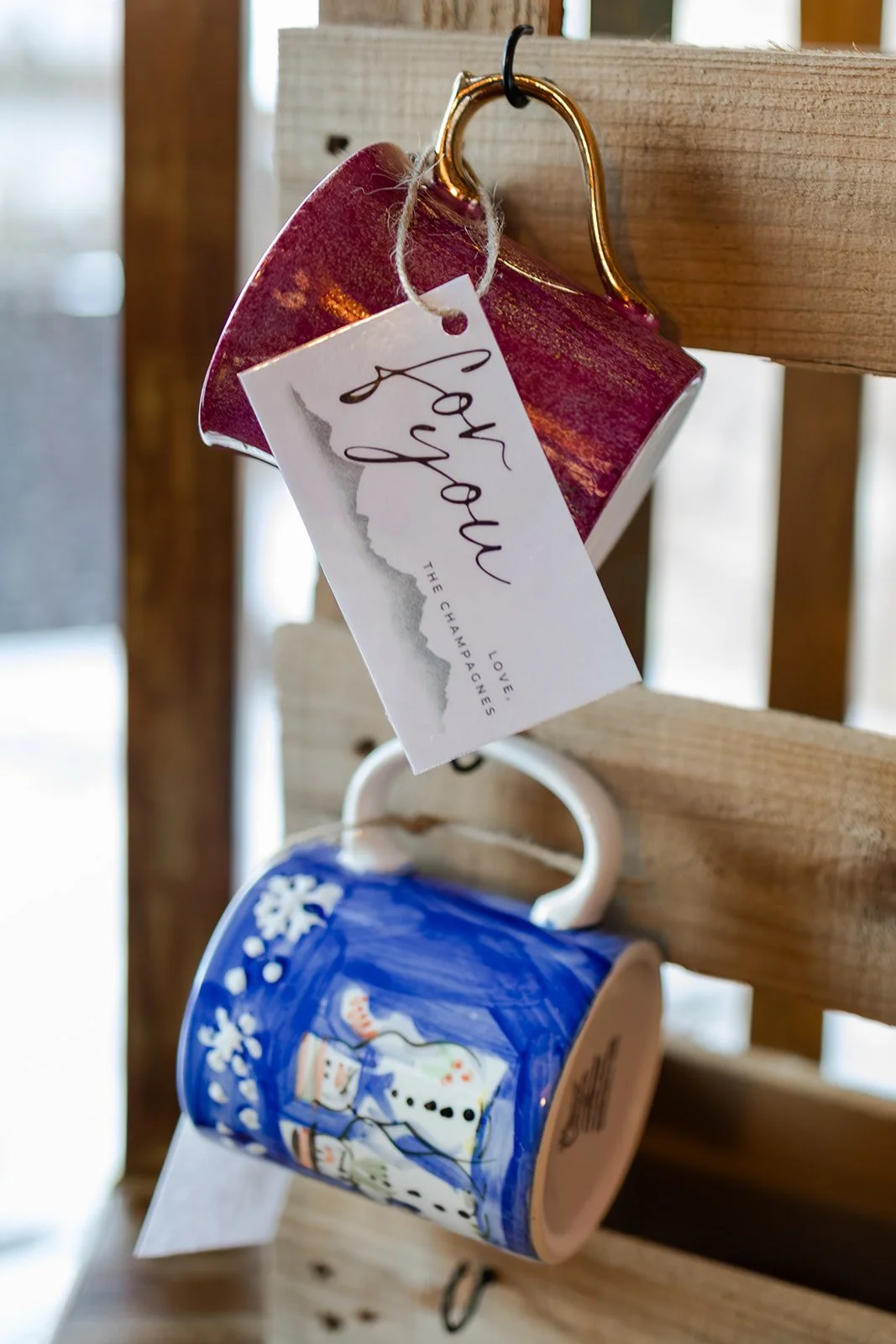 Personalized coffee mug favors from a couple's micro wedding in Granby, Colorado. Photography by Trail Magic Elopements and Micro Weddings.