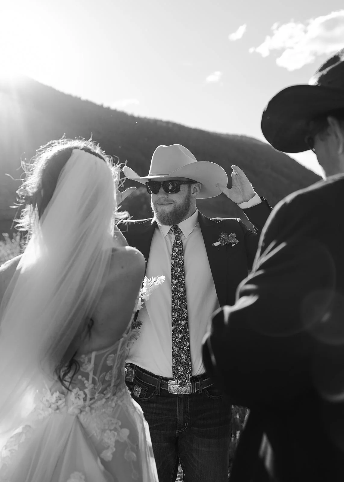 Groom embracing his guests after his micro wedding ceremony at Peanut Lake in Crested Butte, Colorado. Photography by Trail Magic Elopements and Micro Weddings.