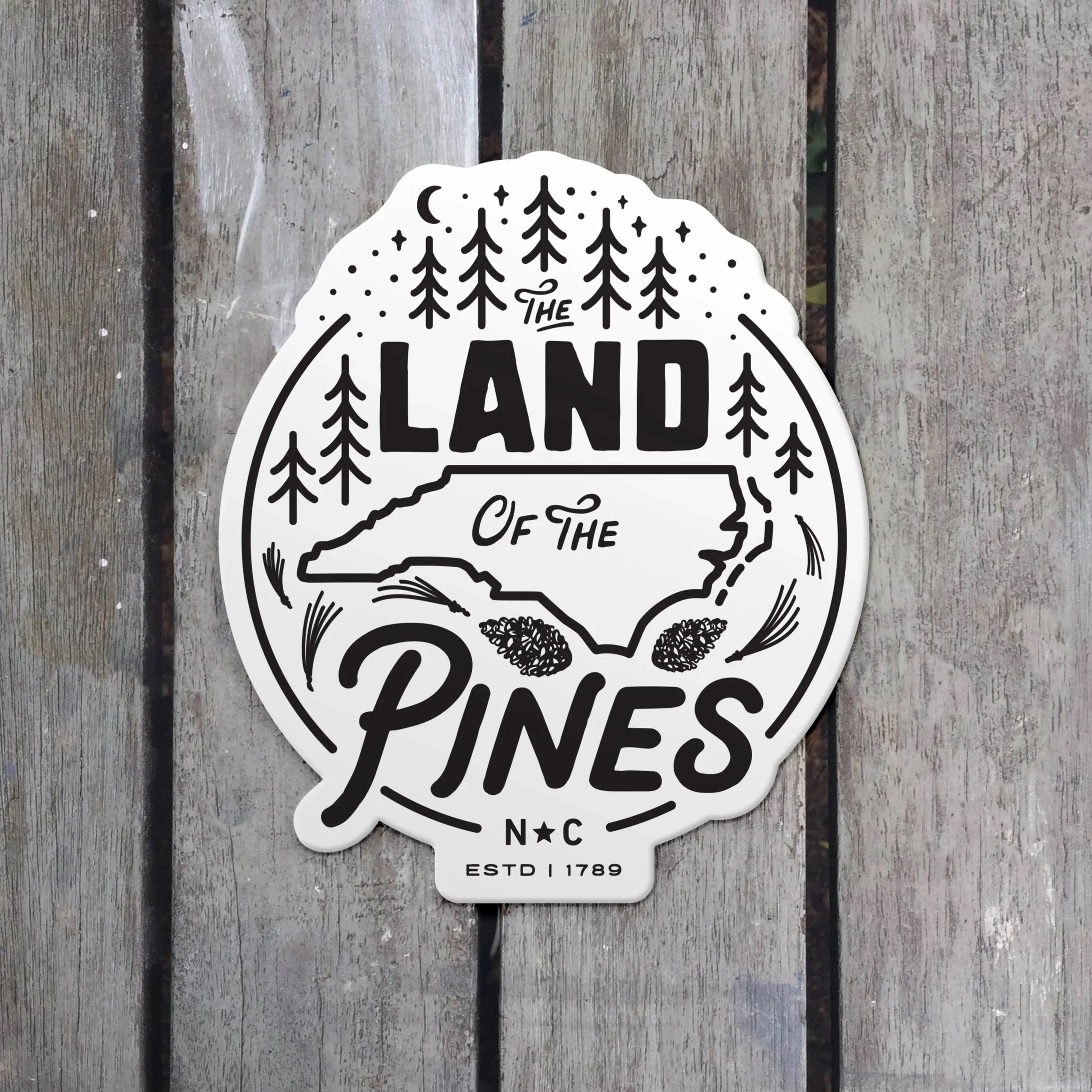 Land+of+the+Pines+STICKER+COMP.jpg