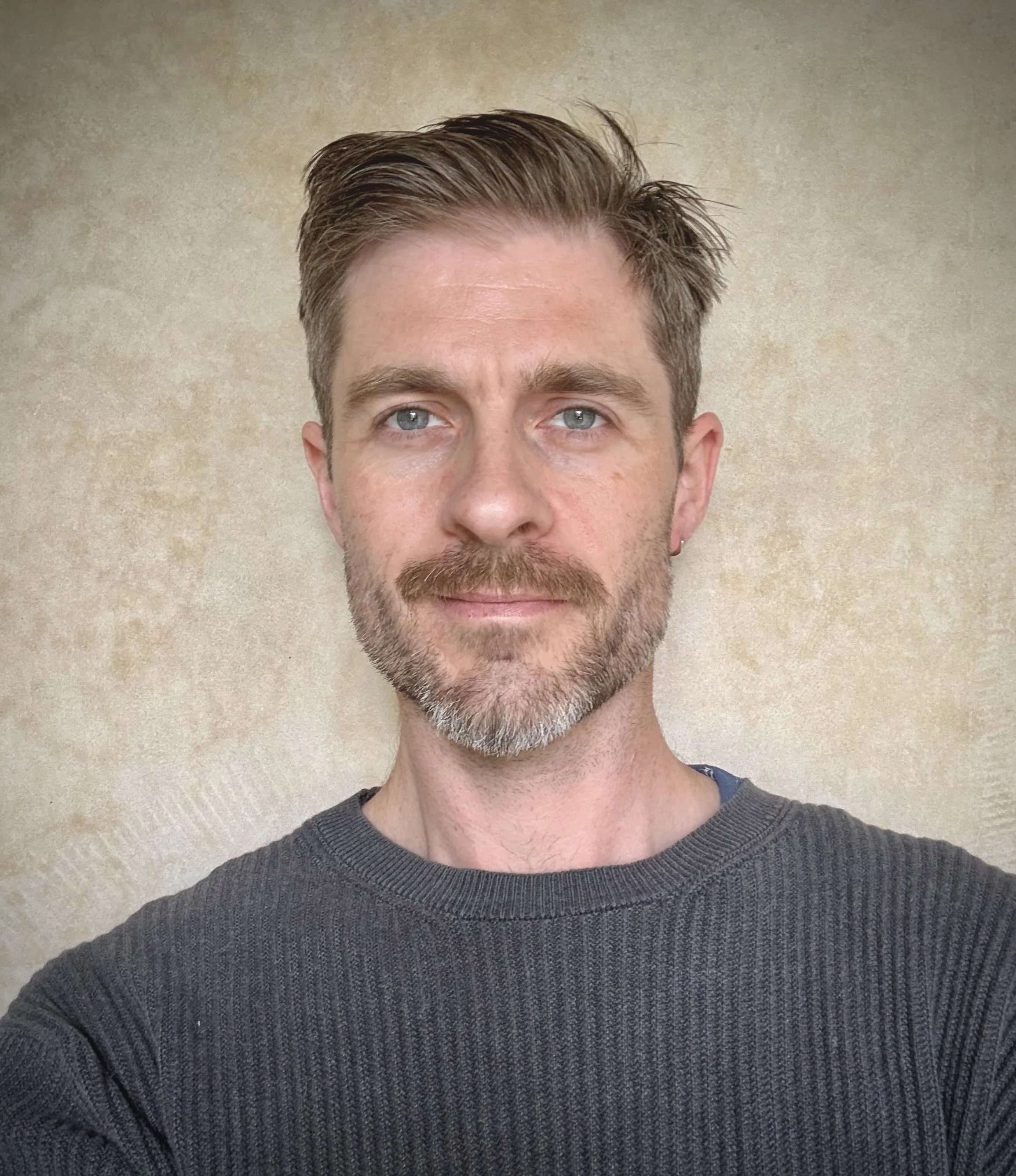 Professional headshot of Sean Hart - a humanistic counsellor at The Brixton Practice in London.
