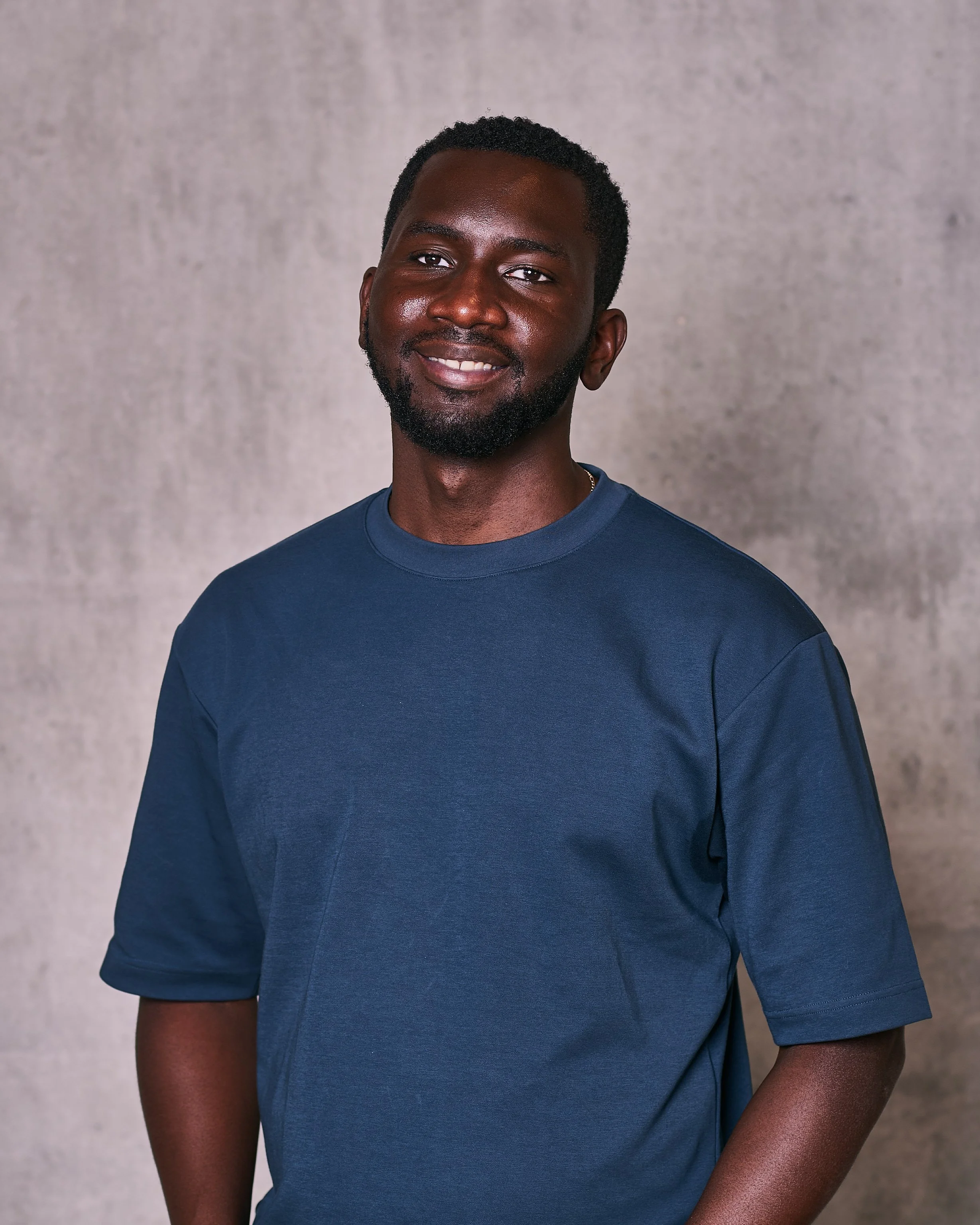 Professional headshot of Ade Dabiri - trainee therapist at the low-cost therapy service at The Brixton Practice