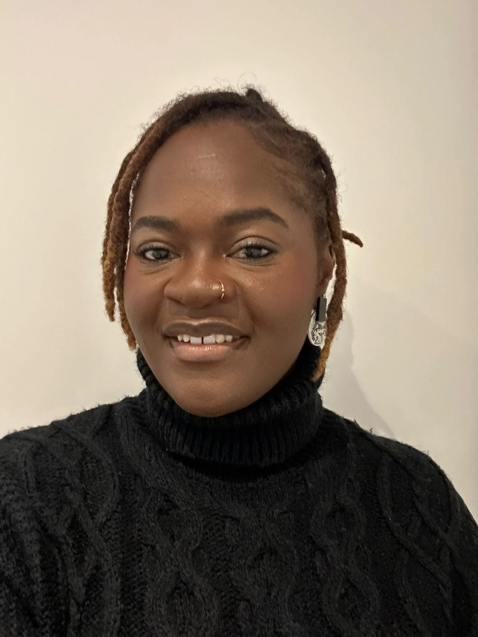 Elizabeth Akindutire's professional headshot - psychodynamic therapist at The Brixton Practice