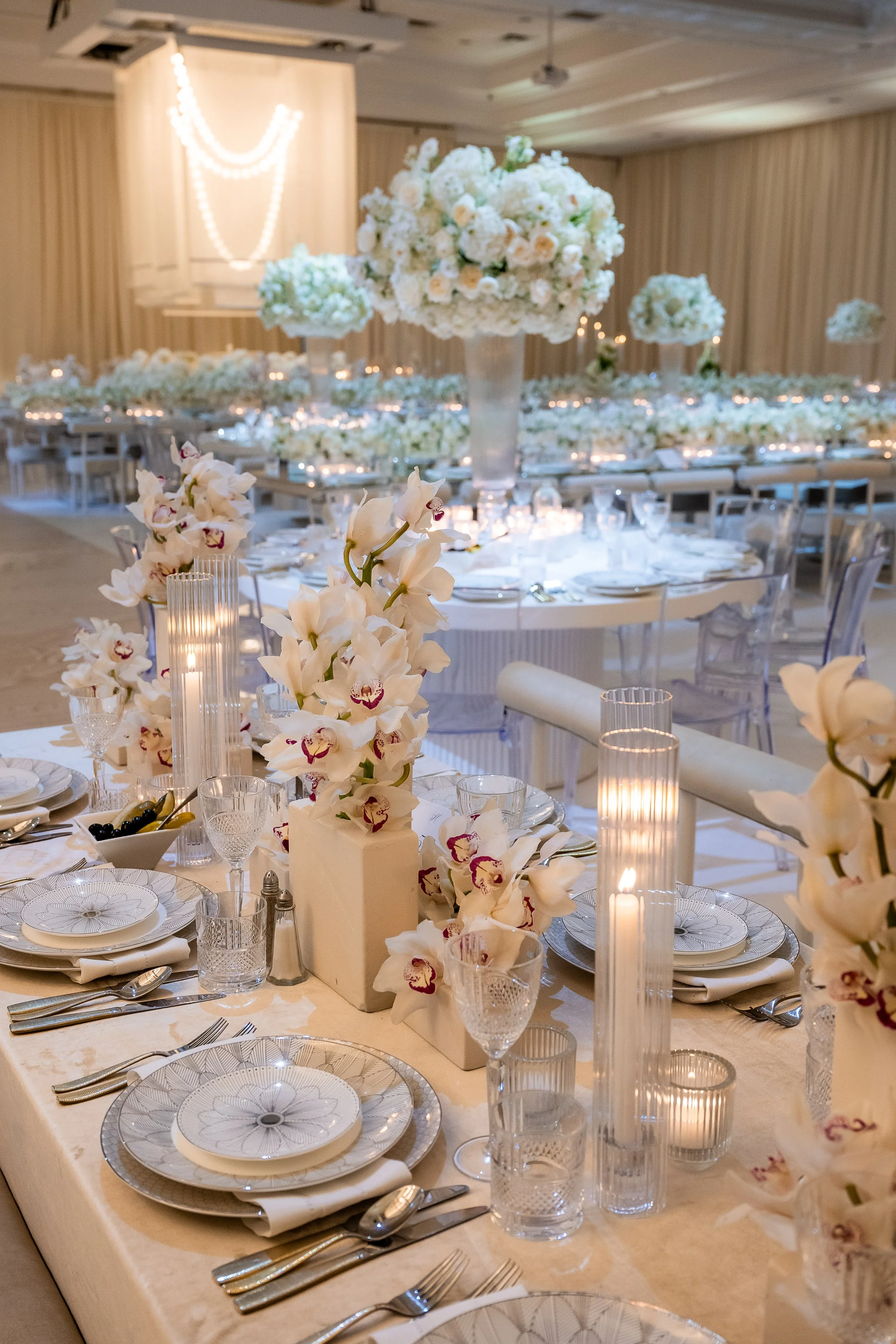 white-cymbidium-orchid-wedding-centerpieces.jpg