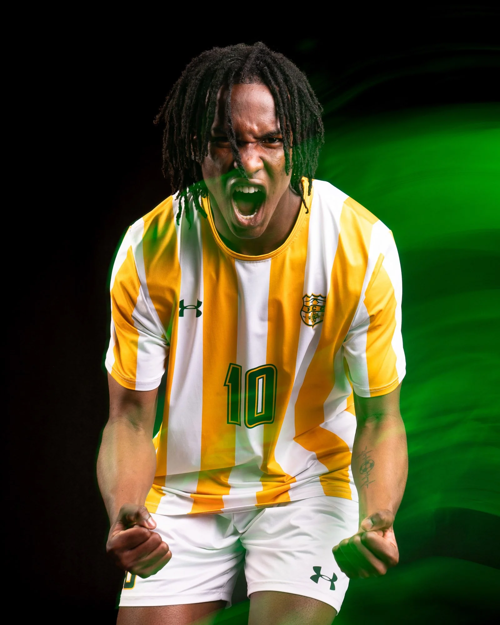 jahiem-j-jamieson-soccer-media-day-portrait-shutter-drag-green-light-trails.jpg