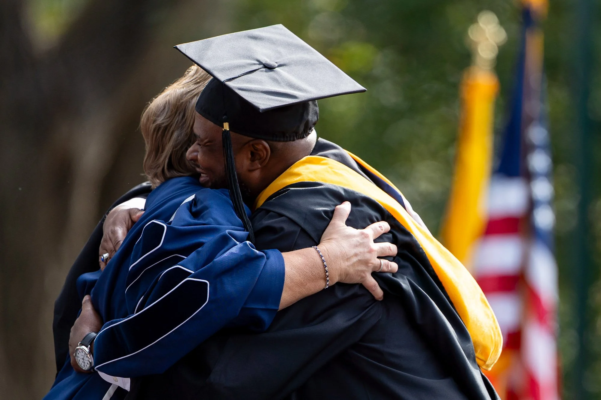 hood-college-president-debbie-ricker-phd-hugs-derrick-harrigan-inauguration-ceremony-frederick-md-crvnka-photography.JPG