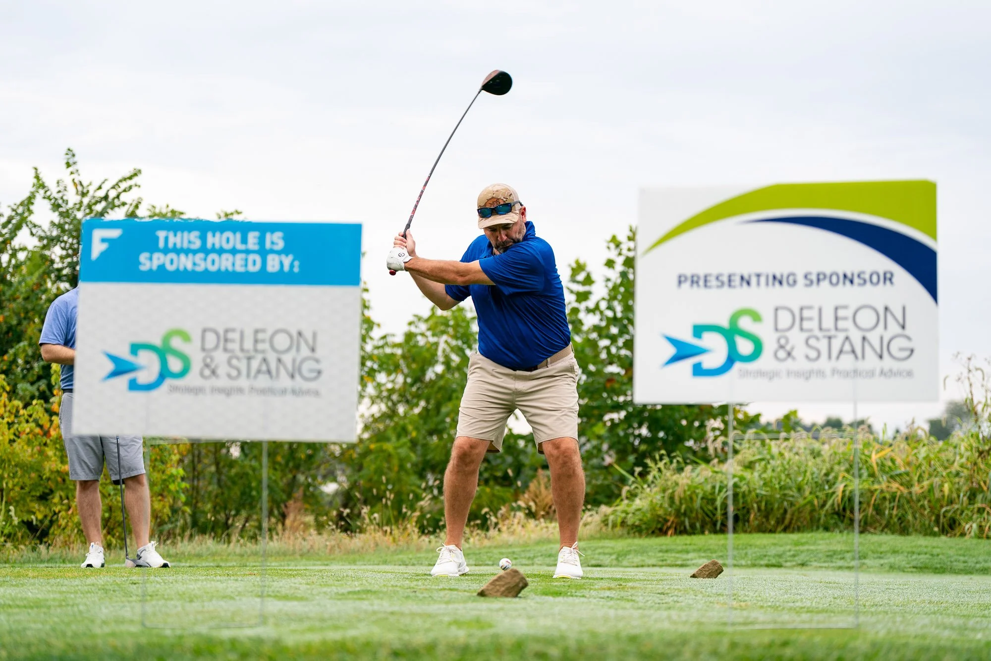 frederick-county-chamber-captains-cup-golf-scramble-2025-deleon-stang-hole-1-golfer-teeing-off-event-photography.JPG