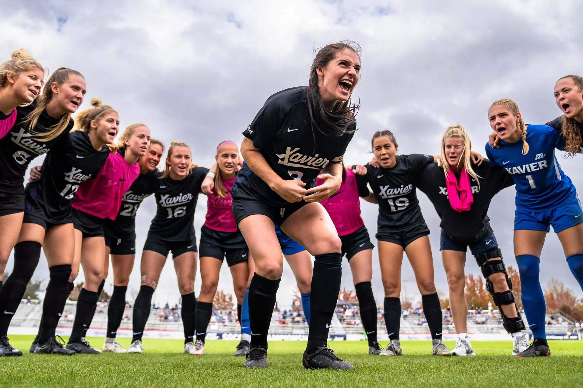 Xavier University captain Molly McLaughlin addresses her teammates during a pregame huddle before the BIG EAST Women’s Soccer Championship final against Georgetown University. (Cody Cervenka/Crvnka Photography)
