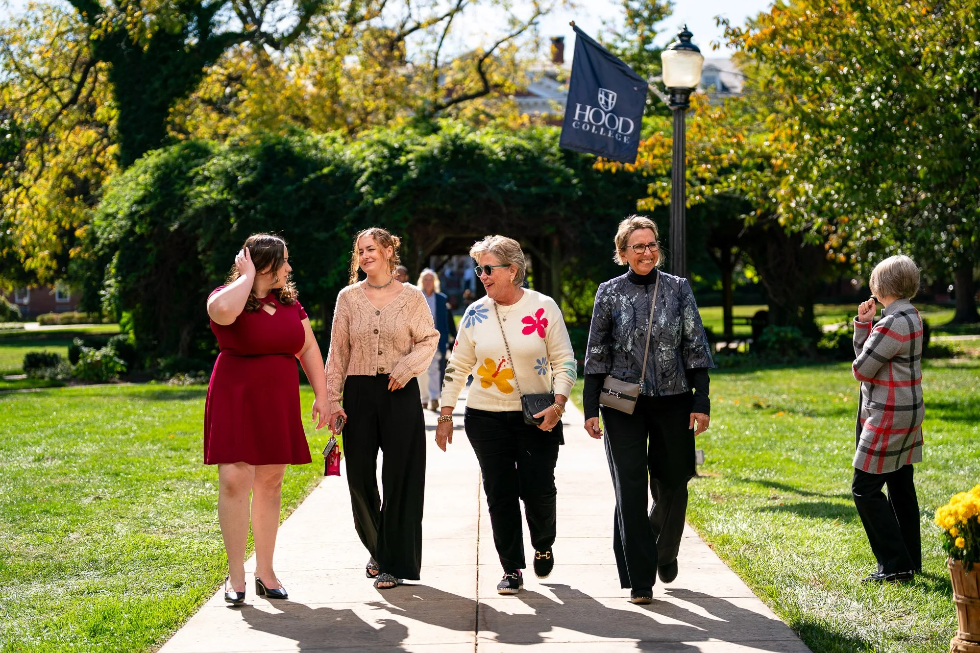hood-college-inauguration-celebration-attendees-walking-pergola-frederick-md-crvnka-photography.JPG
