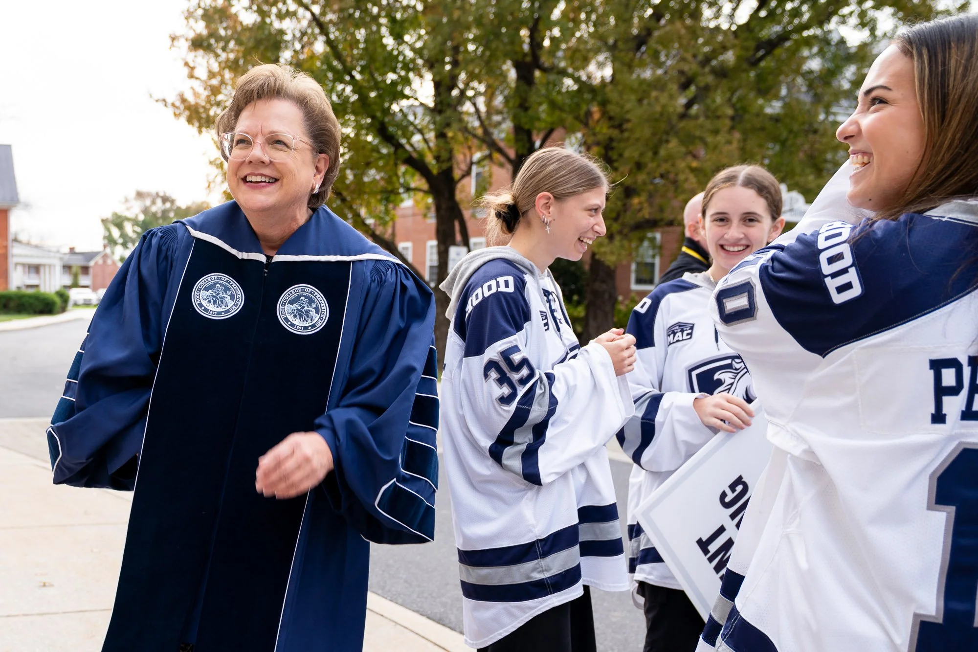 hood-college-president-debbie-ricker-phd-greets-womens-hockey-team-inauguration-frederick-md-crvnka-photography.JPG