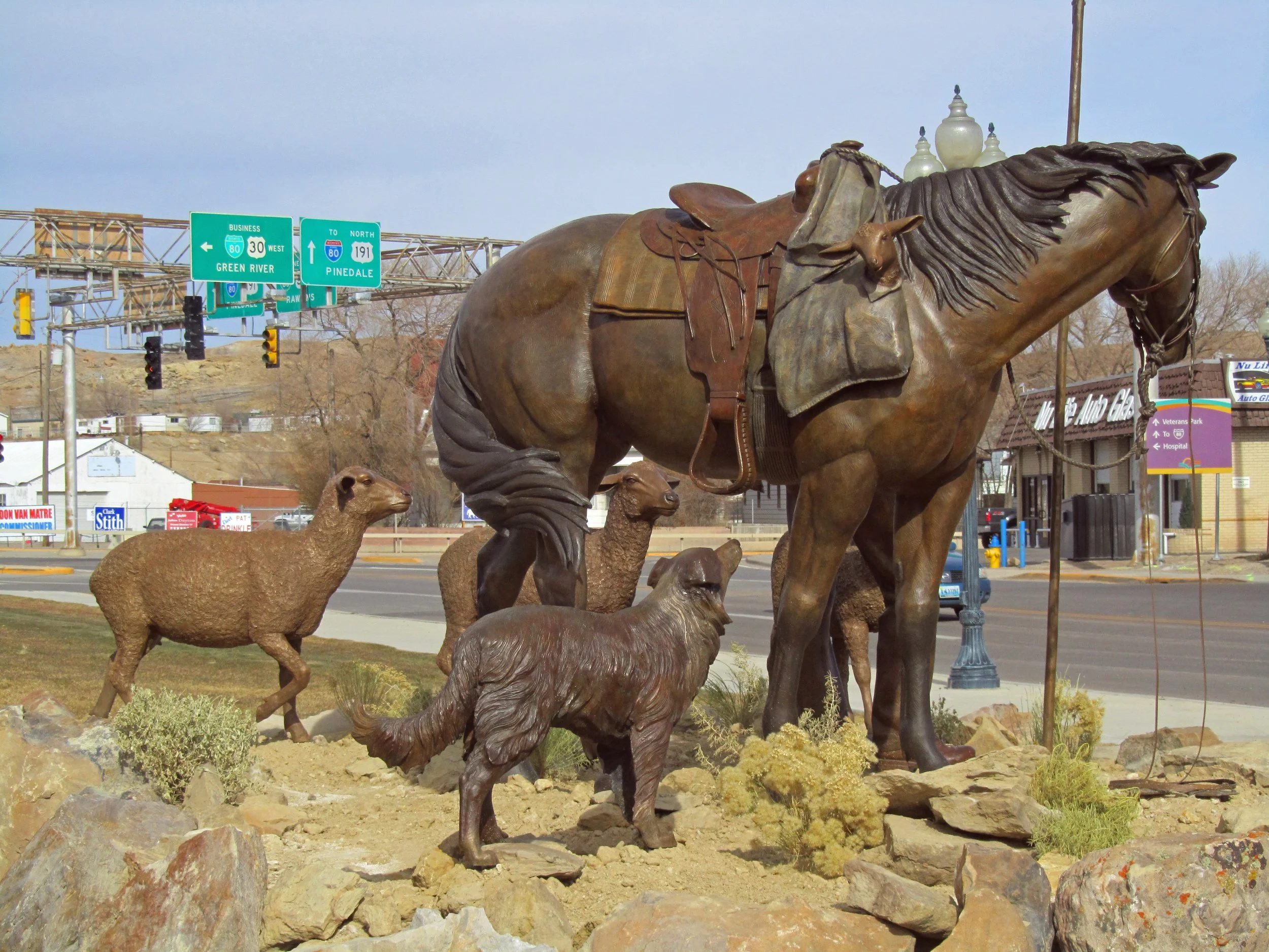 At one time, back when wool was used for everything from carpets to clothing, Rock Springs was the world capital of the sheep industry. This sculpture, Lambing Season, celebrates the connection between the shepherd and his animals.
