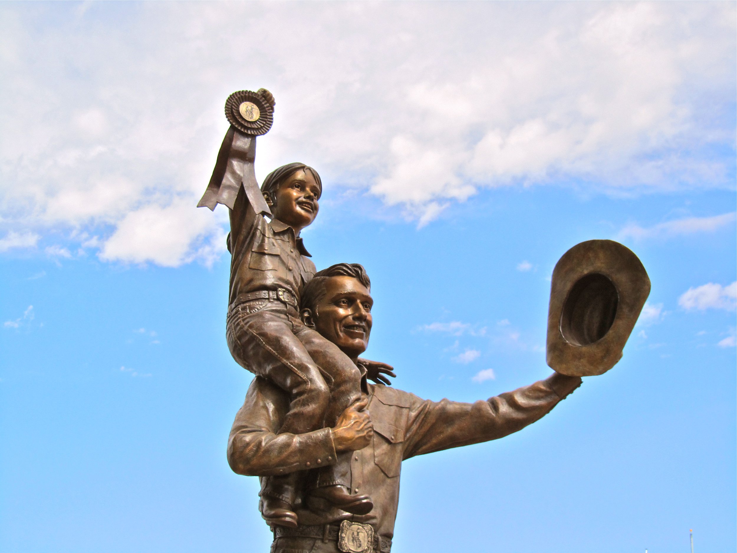 This sculpture captures the spirit of doing your best in competition, and focuses on the younger generation of ranch families carrying on the tradition of those who went before them.