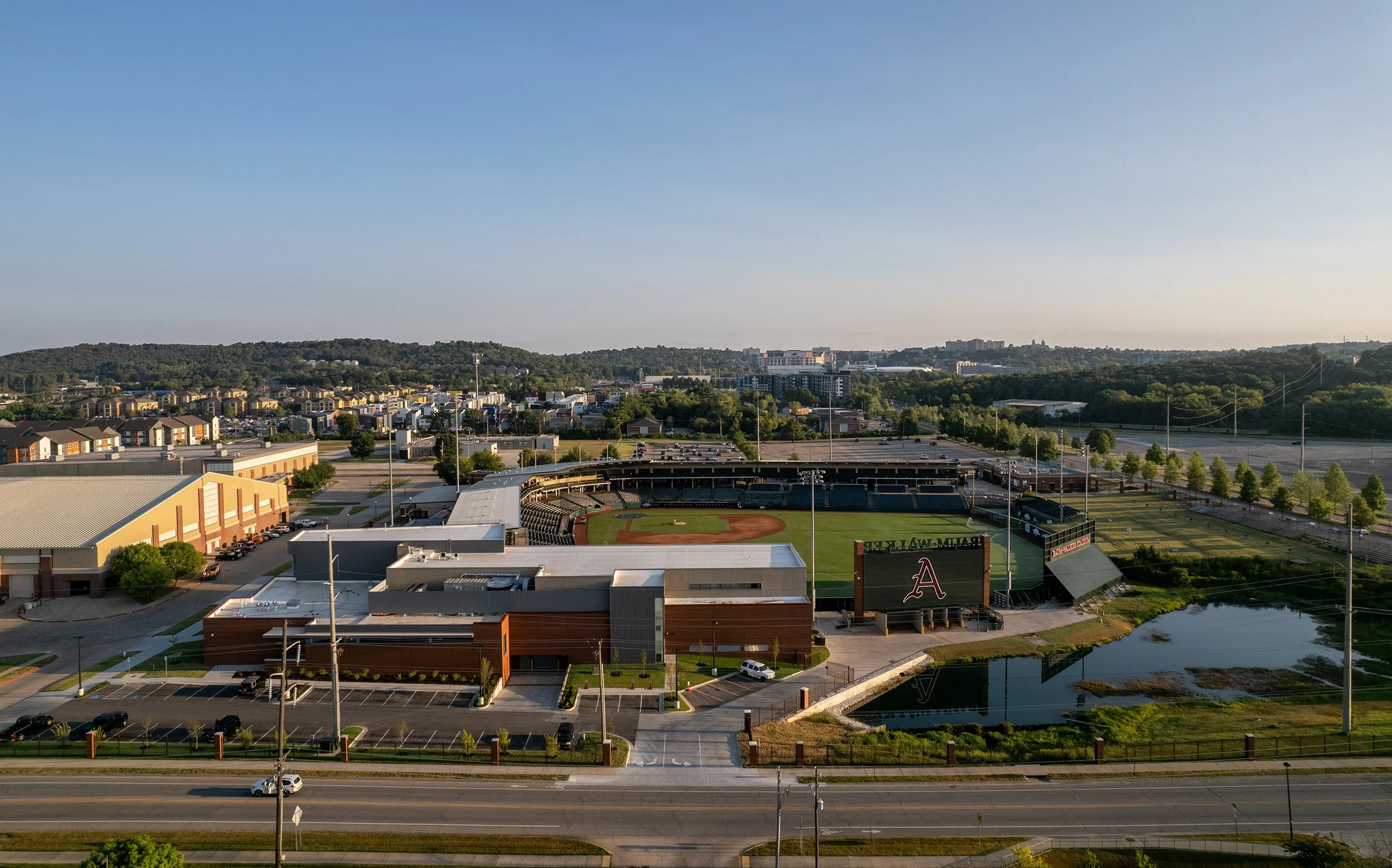 University-of-Arkansas-Baseball-Development-Center-Sunrise-Aerial-Stadium-Wide.jpg