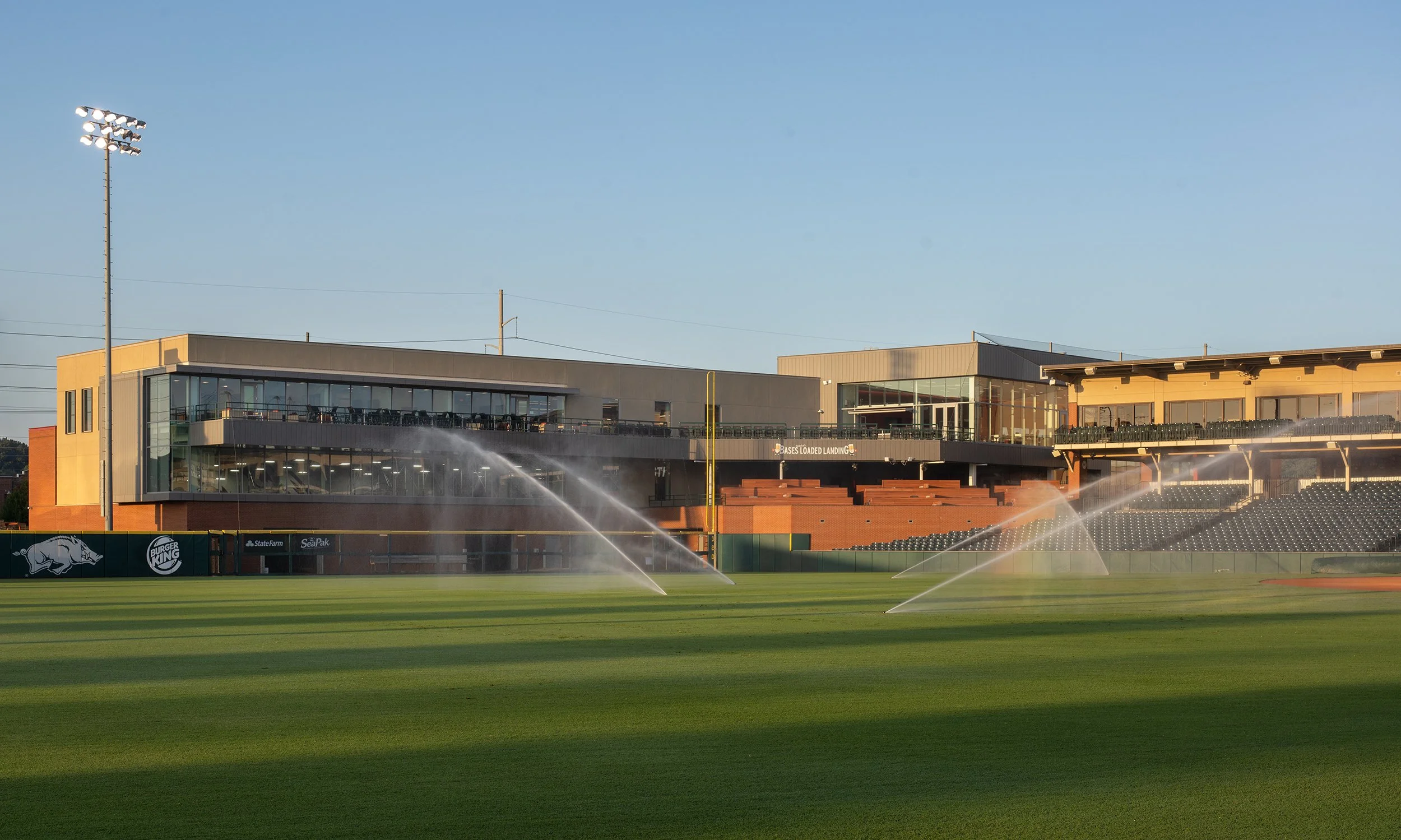 University-of-Arkansas-Baseball-Development-Center-Sunrise-with-Sprinklers1.jpg