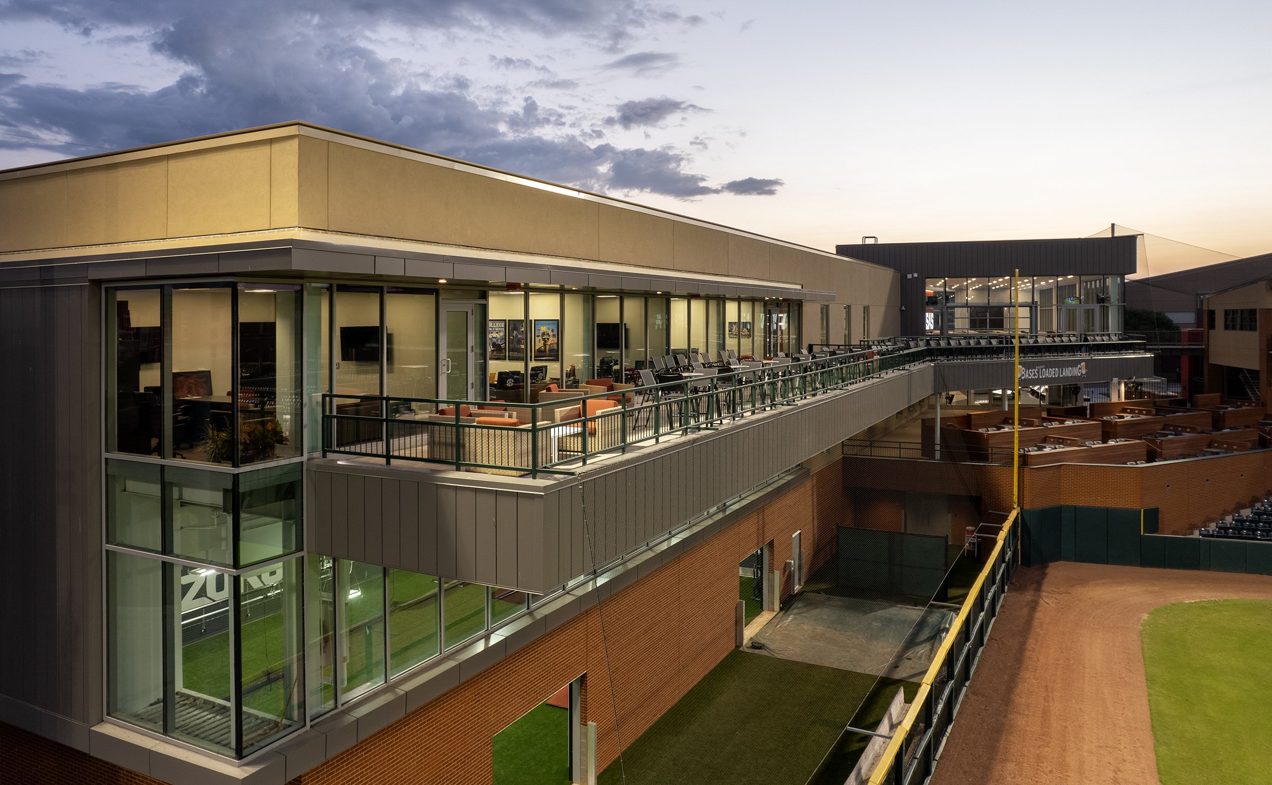 University-of-Arkansas-Baseball-Development-Center-Dusk-Aerial-Executive-Deck.jpg