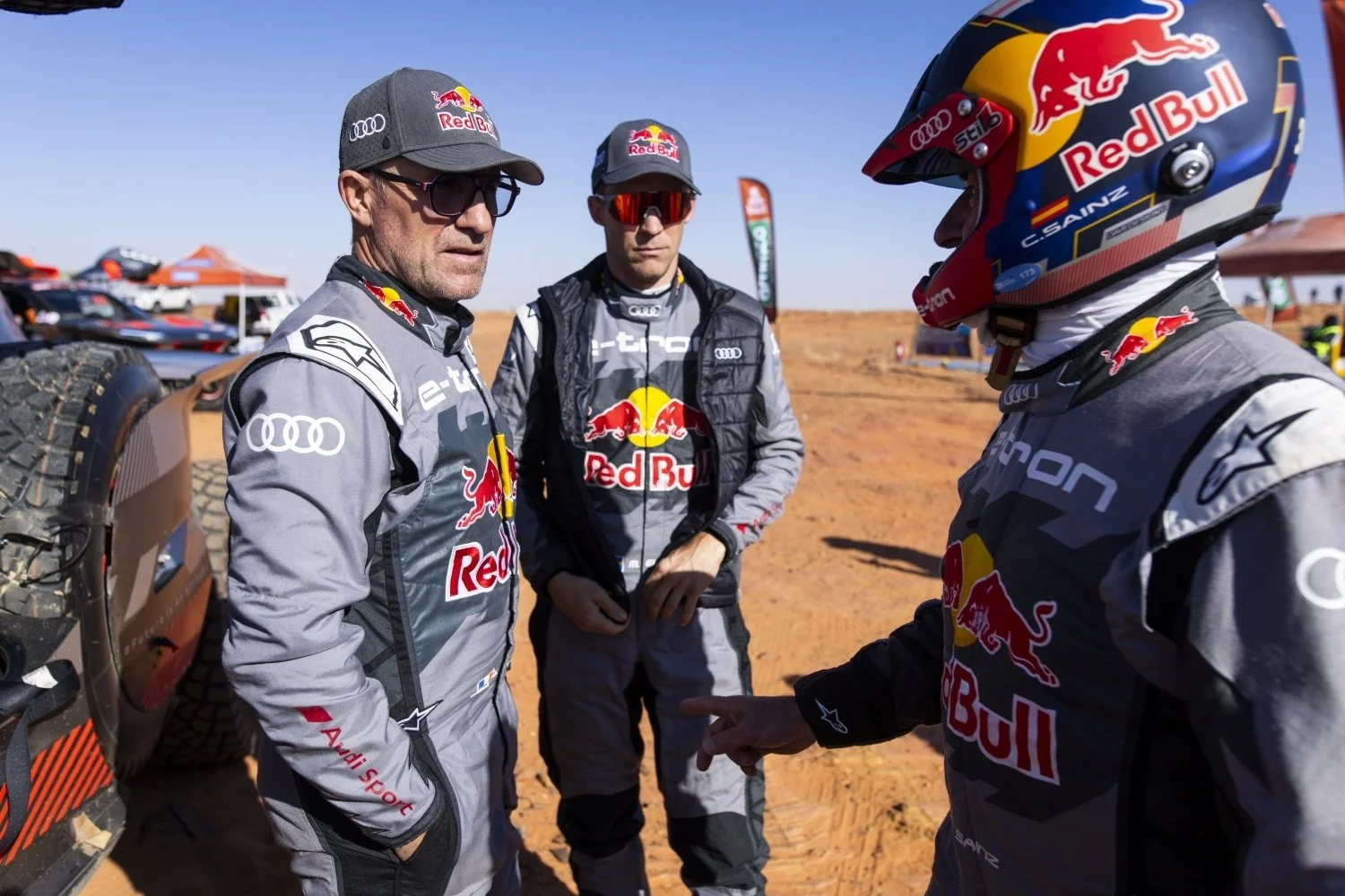 Audi E-Tron Team Drivers in Red Bull Race Suits