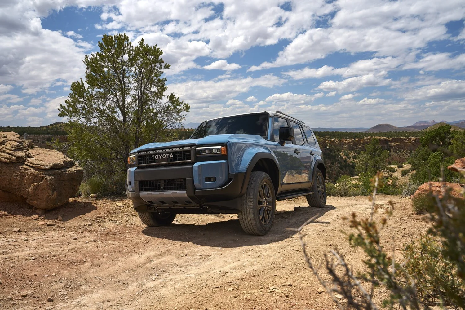 Toyota Land Cruiser on a dirt and rock trail