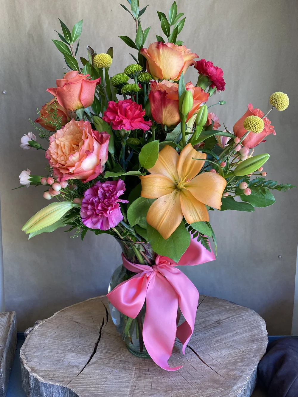 Pink, Coral, Orange Flowers in a vase — Sunset Gardens Greenhouse \u0026 Floral, image size:1000x1333