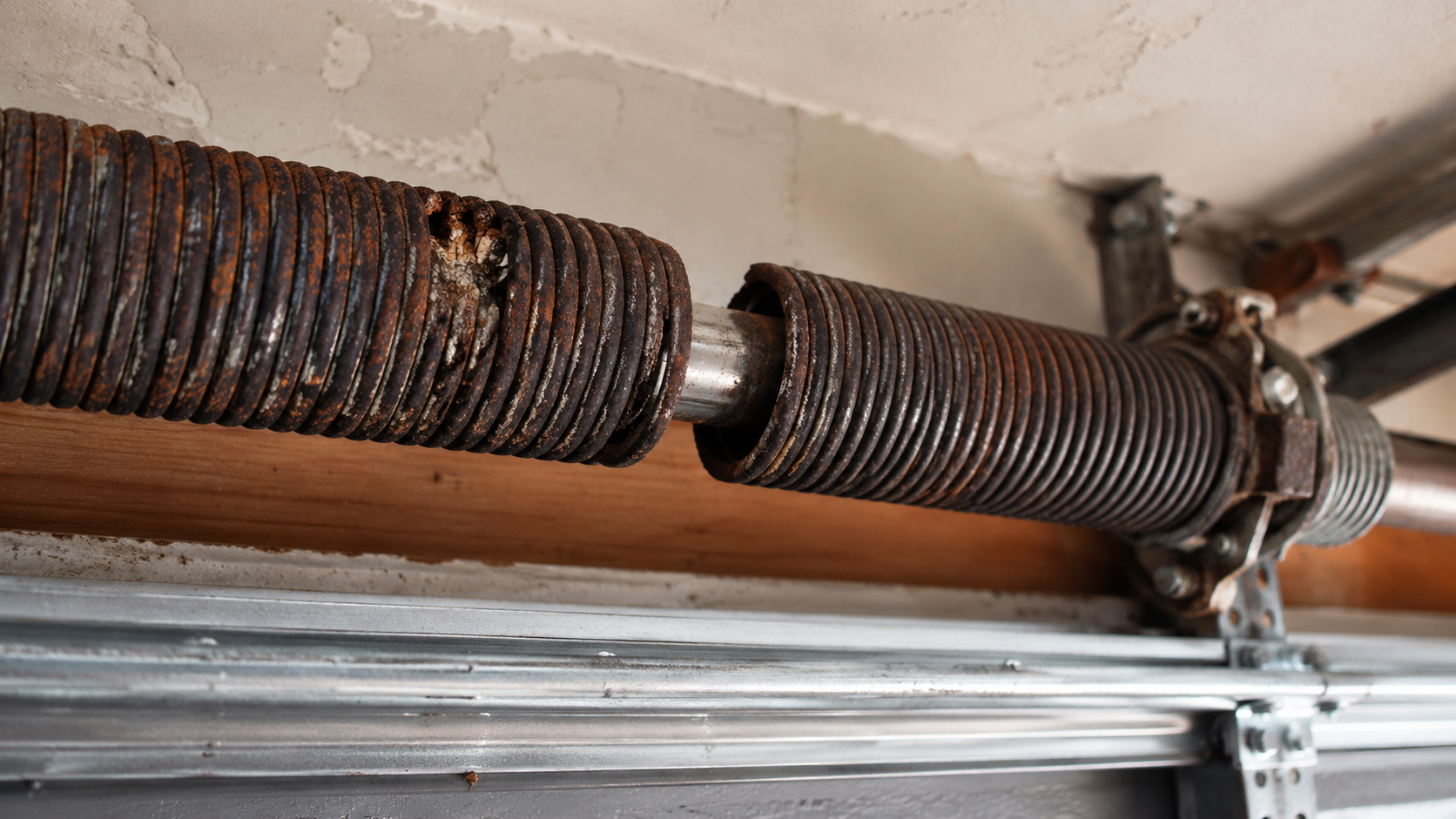 Why Garage Door Springs Snap More Often in Hot Climates