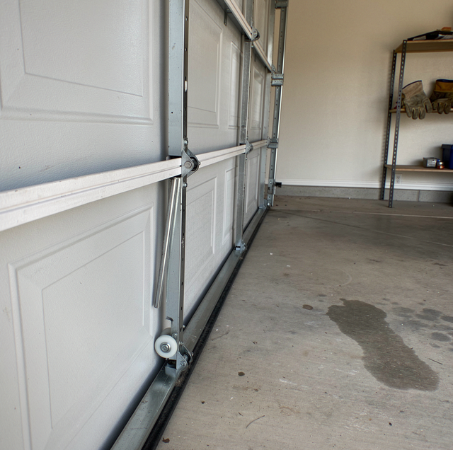Garage Door Off Its Track? What to Do First (and What Never to Try)