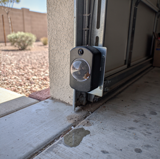 Why Dust on Garage Door Photo-Eye Sensors Causes False Reversals