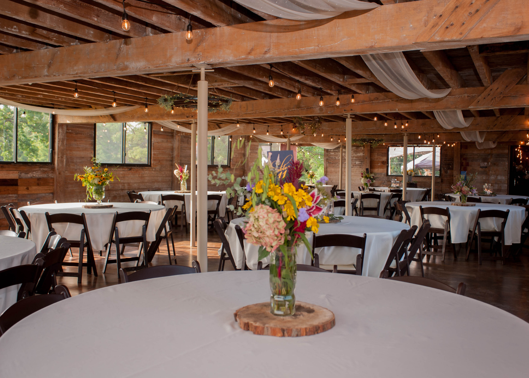 Image of a Barn Interior Set up for an event like a party or wedding