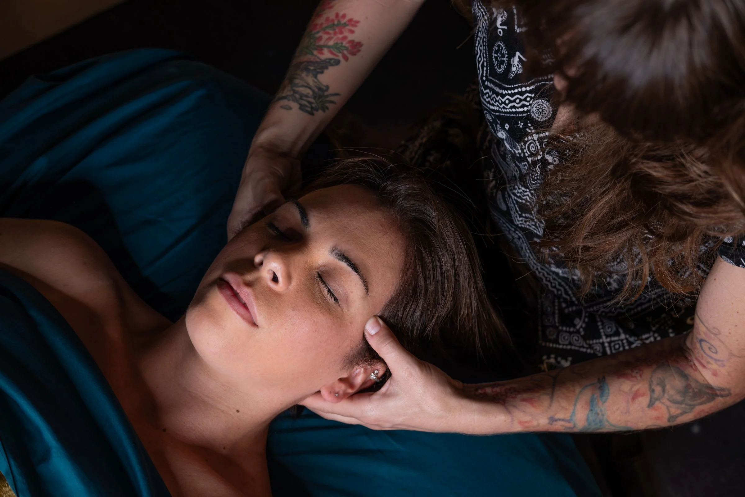 Person receiving TMJ massage to help with stress and tension