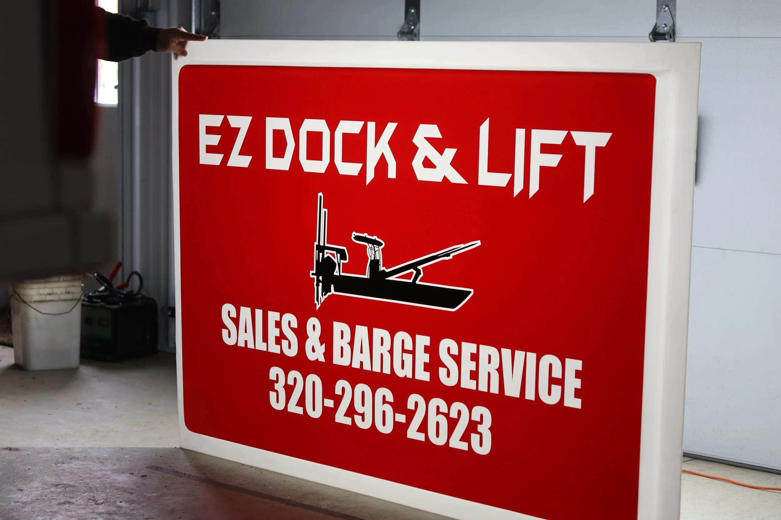 EZ Dock is actually located in between Dassel & Cokato. We did a custom lighted sign for them in vinyl.