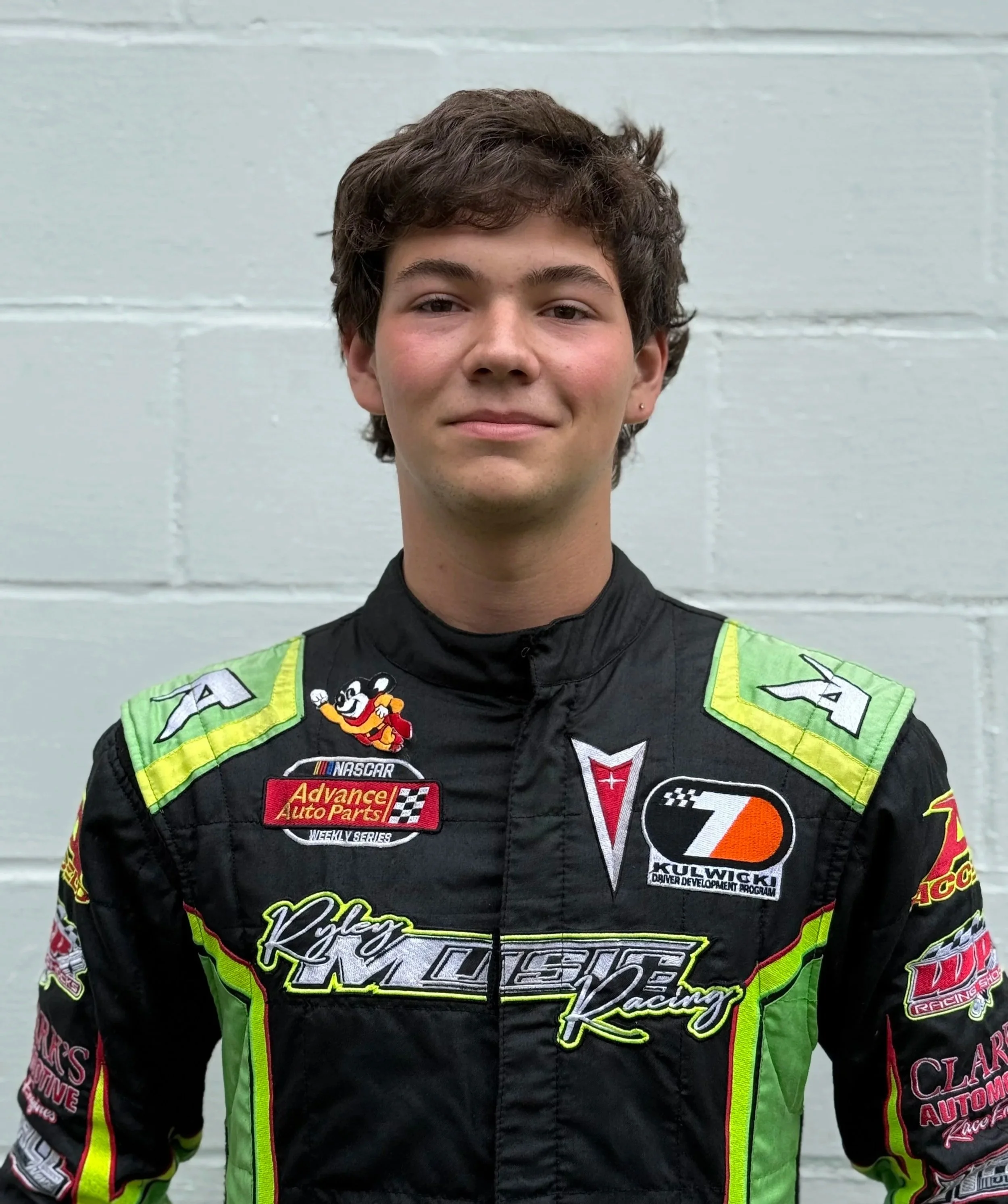 Ryley Music in a firesuit