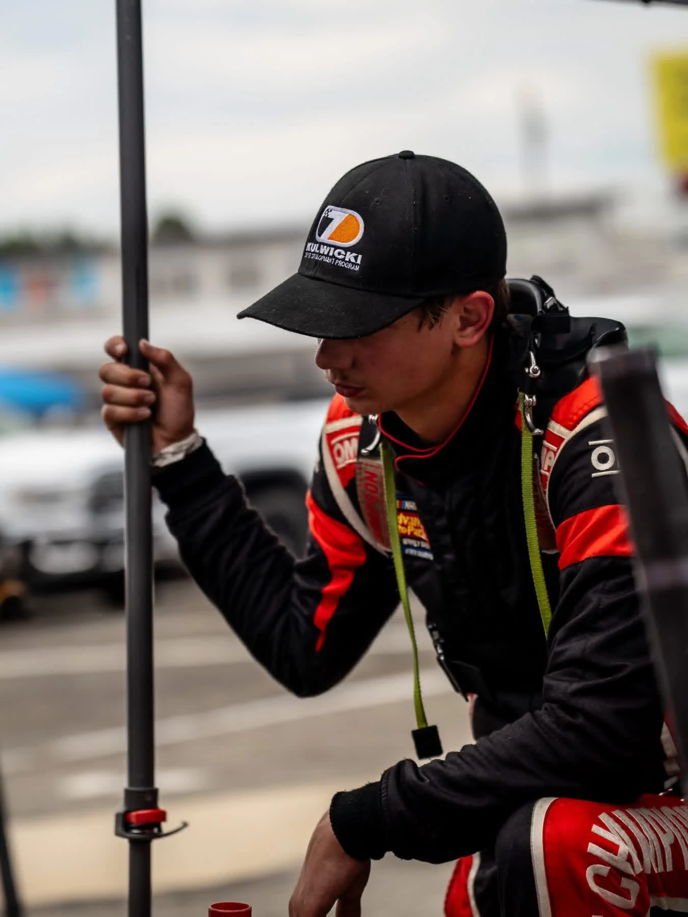 Johnson in firesuit at racetrack