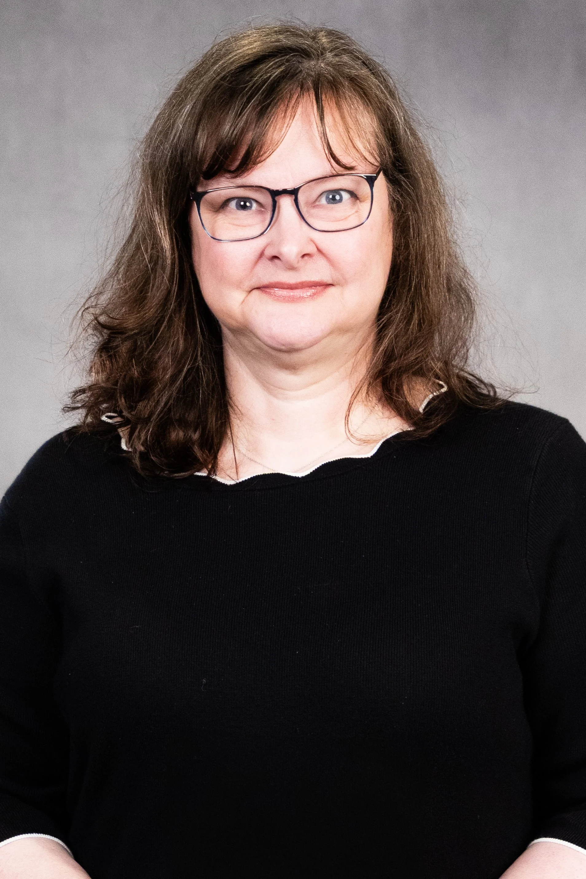 Julie Uphold-Fountain Headshot-3.jpg