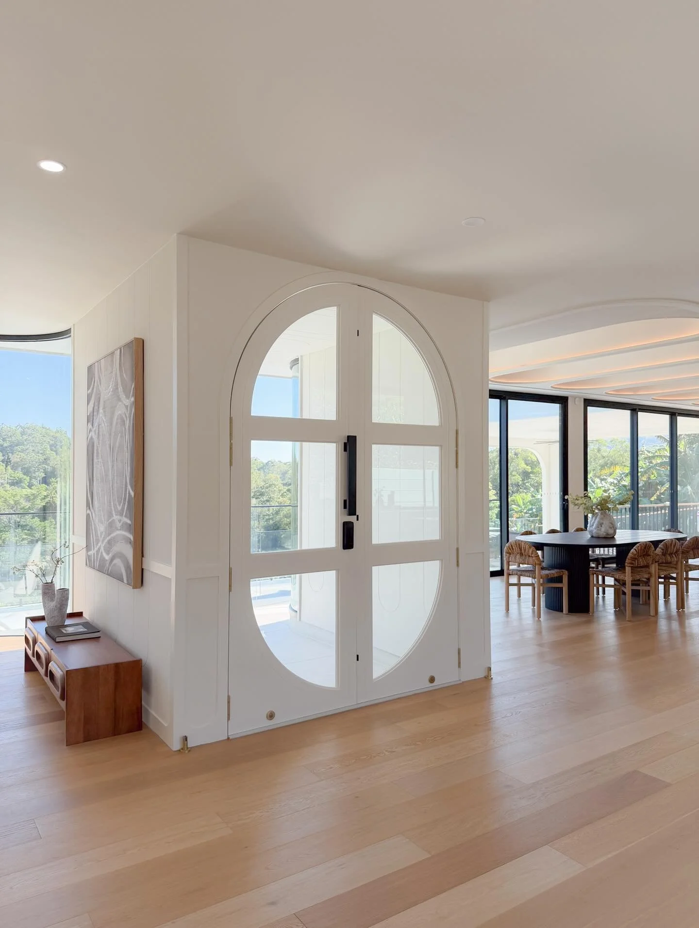 Set within the hills of Bonogin, this home embraces modern elegance through subtle curves and refined finishes.

Featuring our bespoke entry door, arched internal doors, curved archways and double archway walkthroughs - A space defined by precision a