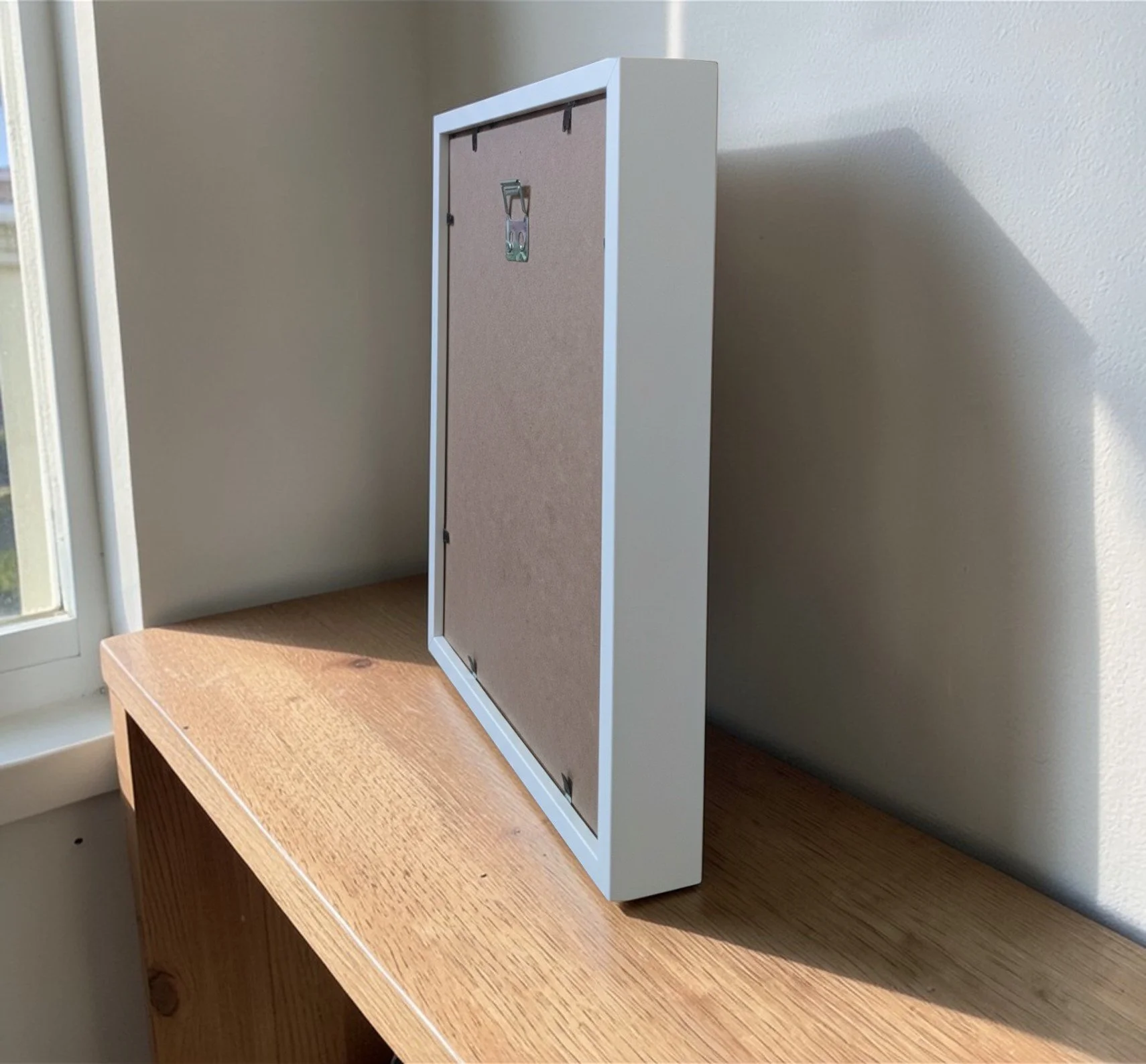 WHITE FRAME SIDE VIEW.jpg