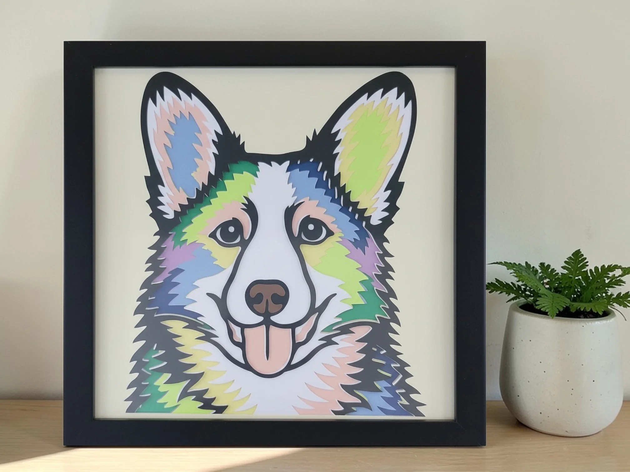 CORGI BLACK FRAME WITH PLANT.jpg